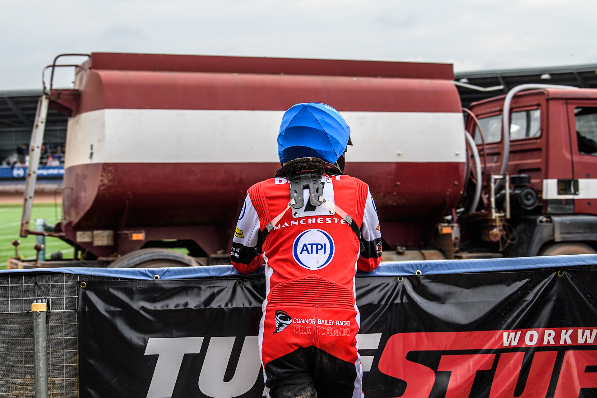 Belle Vue Aces' Connor Bailey  watches the water truck preparing the track during the Rowe Motor Oil Premiership match between Belle Vue Aces and Birmingham Brummies at the National Speedway Stadium, Manchester on Monday 6th May 2024. (Photo: Ian Charles | MI News)
