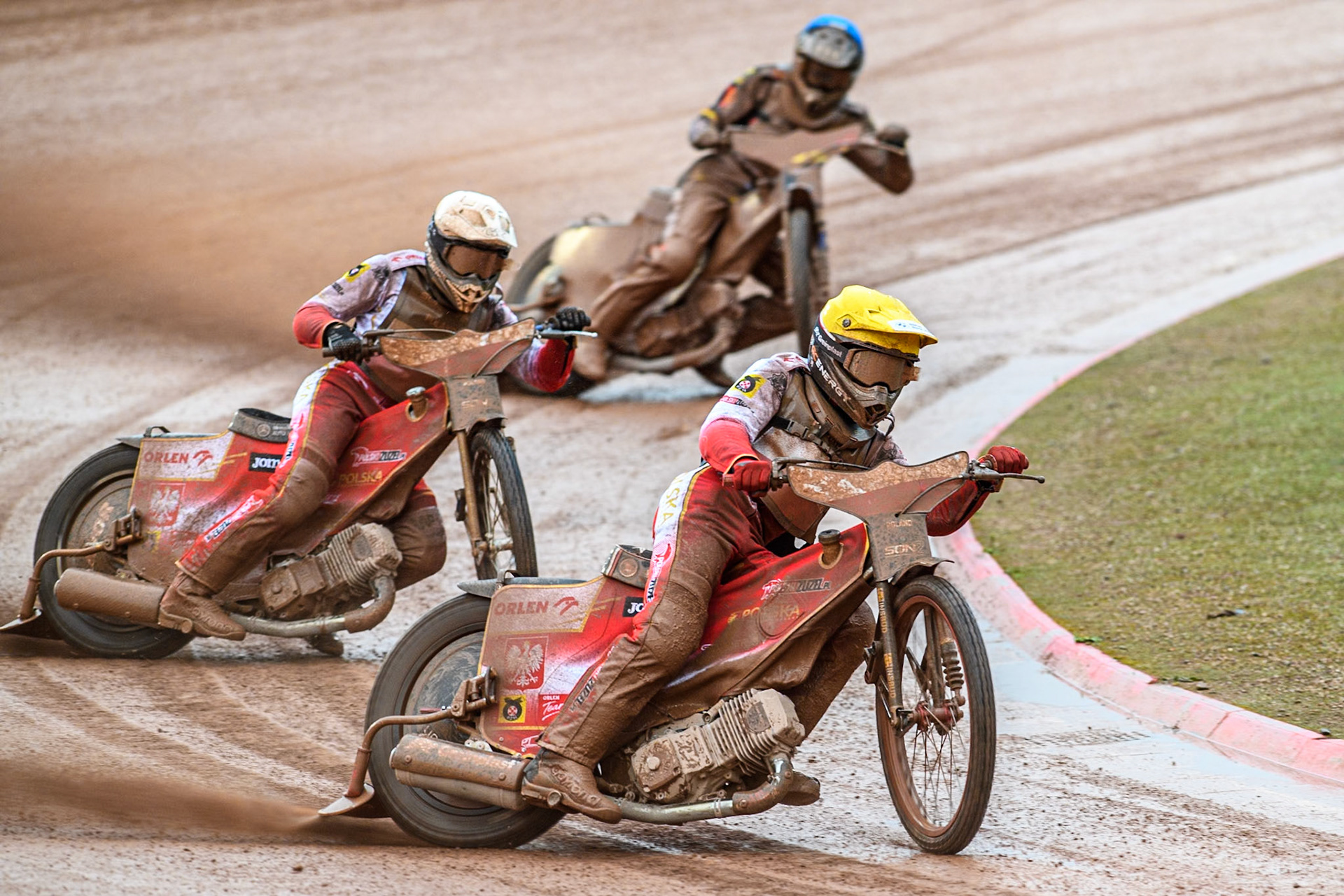 Bartosz Banbor of Poland in Yellow leading Wiktor Przyjemski of Poland in White and Jonny Wynant of Germany in Blue during the Monster Energy FIM Speedway of Nations 2 (Under 21) Final at the National Speedway Stadium, Manchester on Friday 12th July 2024. (Photo: Ian Charles | MI News)