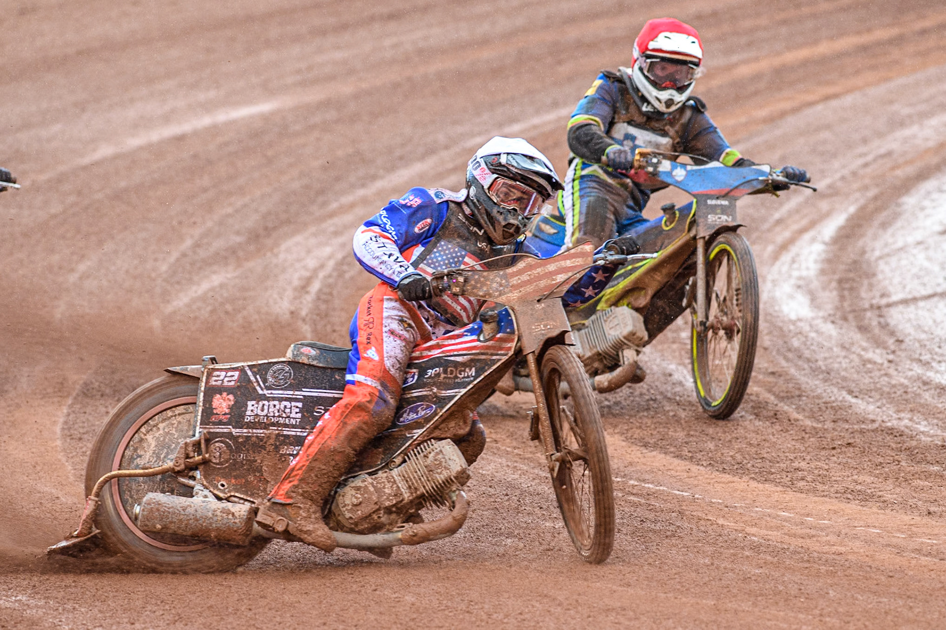 Luke Becker of the USA in White leading Anze Grmek of Slovenia in Red during the Monster Energy FIM Speedway of Nation Semi Final 2 at the National Speedway Stadium, Manchester on Wednesday 10th July 2024. (Photo: Ian Charles | MI News)