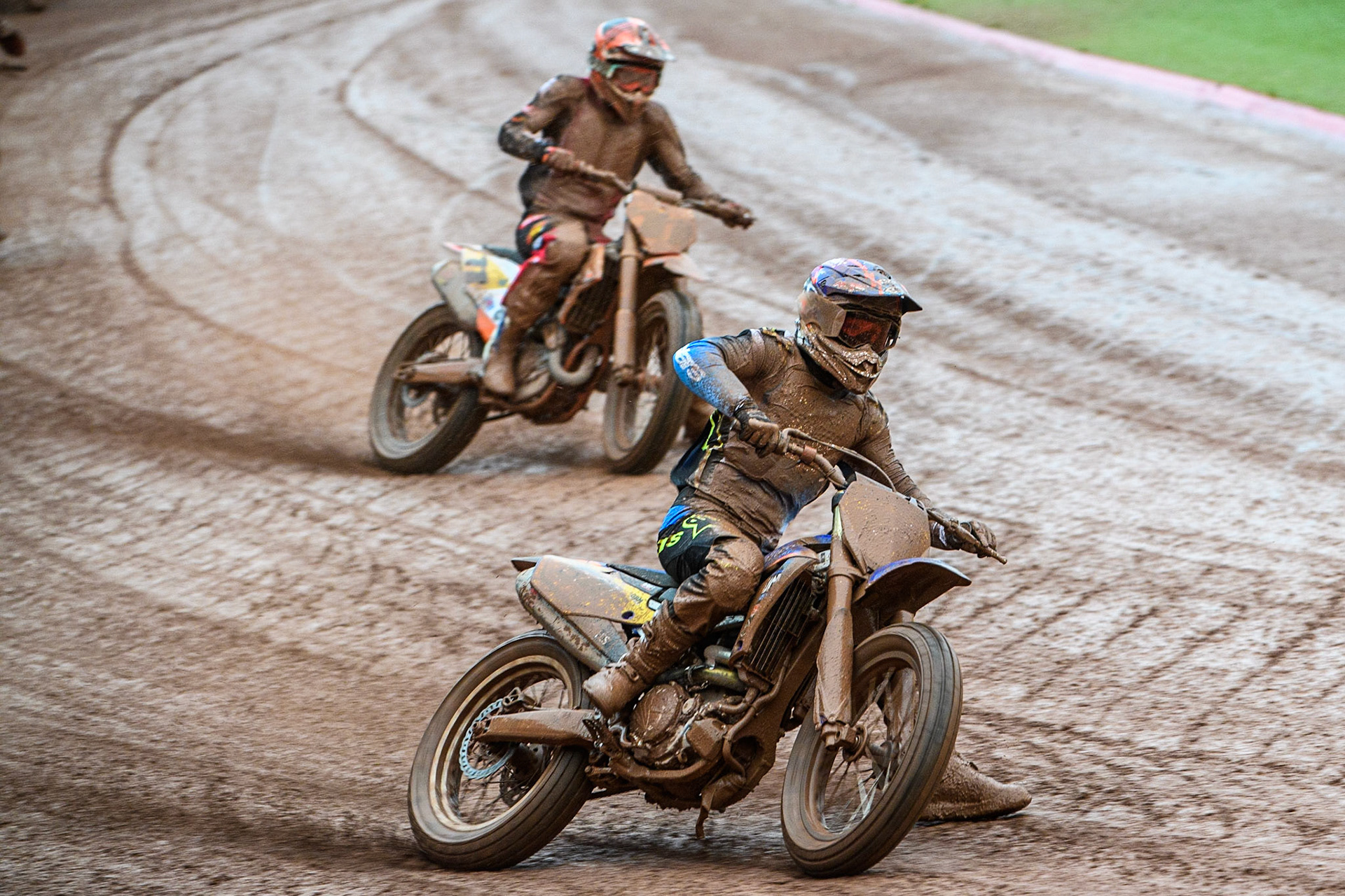 Tim Neave (54) from Great Britain leading Giacomo Bossetti (11) from Italy during the FIM World Flat Track Championship Round 1 at the National Speedway Stadium, Manchester on Saturday 5th August 2023. (Photo: Ian Charles | MI News)