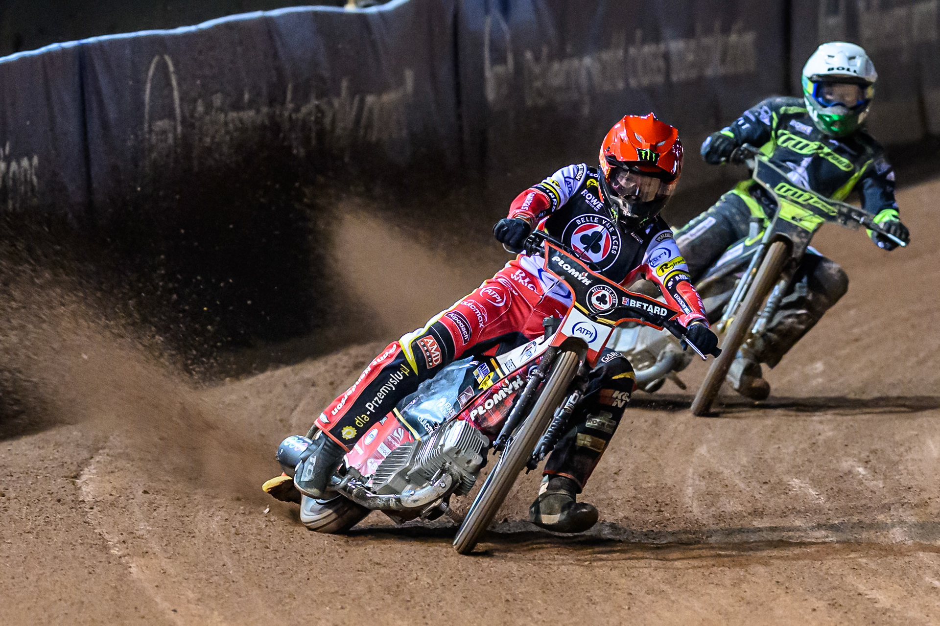 Dan Bewley of Belle Vue Aces  in Red leading Jason Doyle of Ipswich Witches  in White during the Rowe Motor Oil Premiership Play Off Semi Final 1 (1st Leg)  between Belle Vue Aces and Ipswich Witches at the National Speedway Stadium, Manchester on Monday 8th September 2025. (Photo: Ian Charles | MI News)