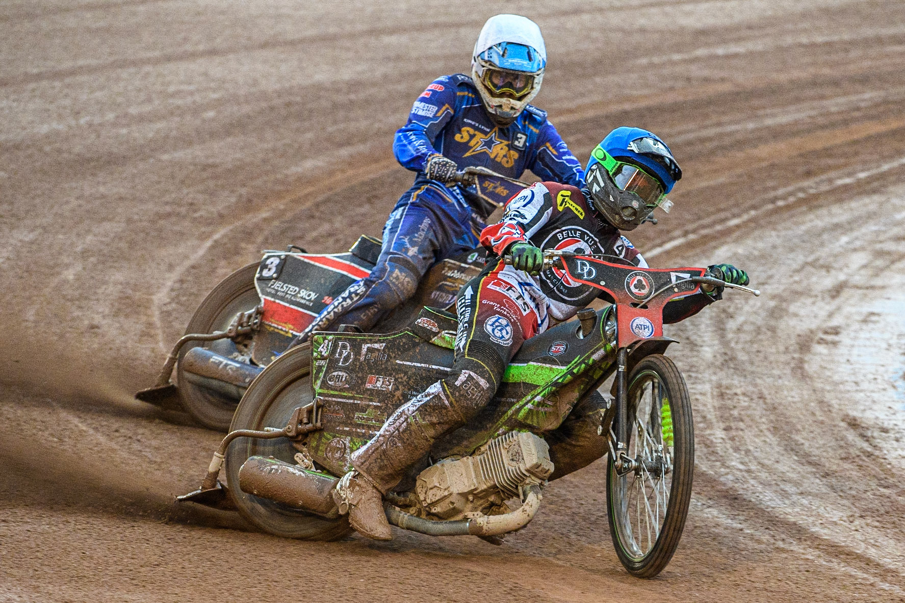 Charles Wright (Blue) leads Frederik Jakobsen (White) during the Sports Insure Premiership match between Belle Vue Aces and King's Lynn Stars at the National Speedway Stadium, Manchester on Monday 12th June 2023. (Photo: Ian Charles | MI News)