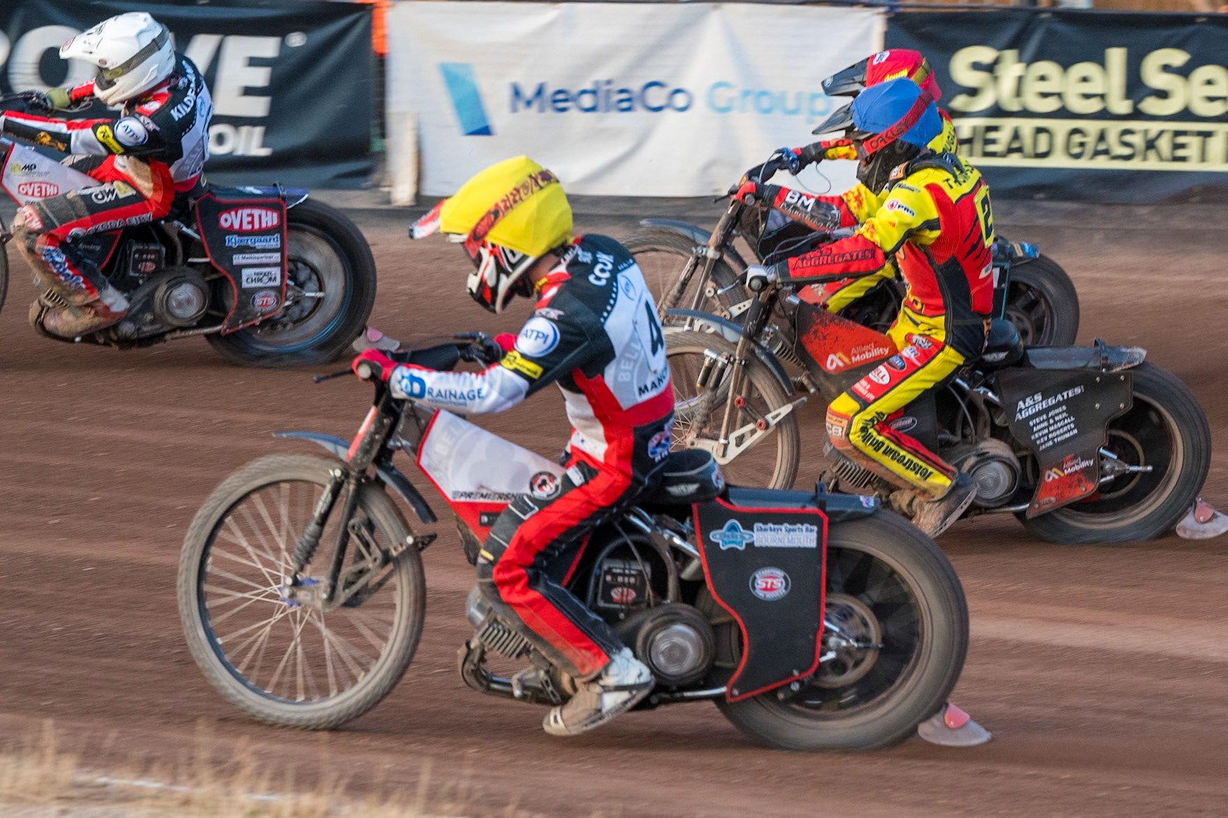Zach Cook of Belle Vue Aces  in Yellow on the inside of Dan Thompson of Leicester Lions  in Blue and Ryan Douglas of Leicester Lions in Red  during the Rowe Motor Oil Premiership match between Leicester Lions and Belle Vue Aces at the Hydroscan Arena, Leicester on Thursday 23rd July 2026. (Photo: Ian Charles | MI News)