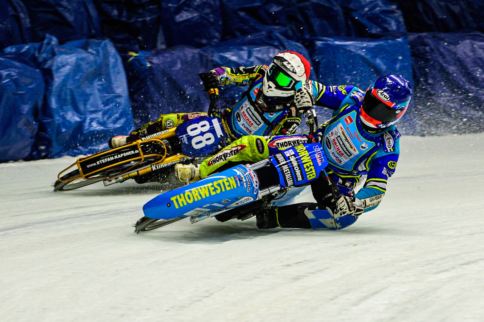 Günther Bauer (Blue) leads Max Niedermaier (Red) during the Race of Legends at the Max-Aicher-Arena, Inzell on Friday 17th March 2023. (Photo: Ian Charles | MI News)