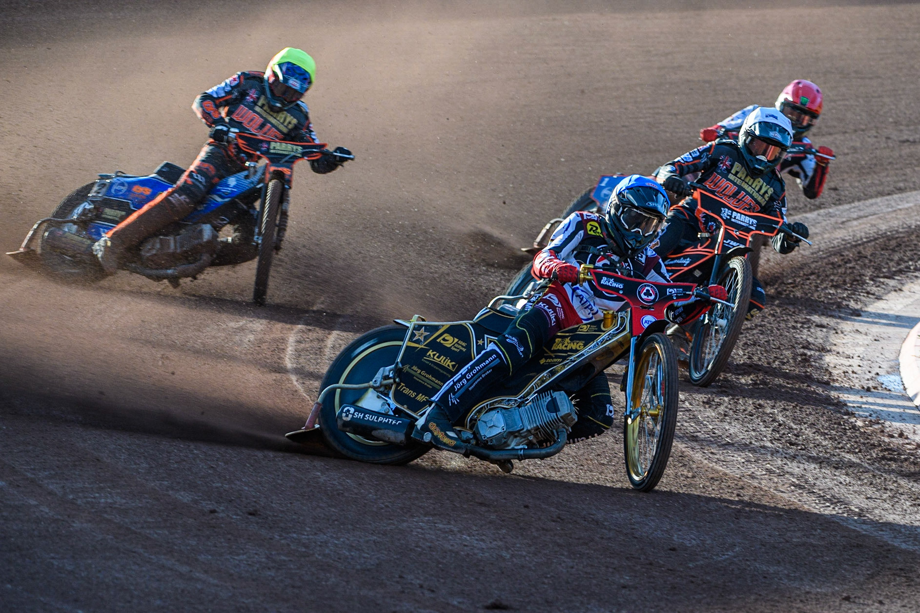 Norick Blodorn (Blue) leads Sam Masters (White), Steve Worrall (Yellow) and Dan Bewley (Red) during the Sports Insure Premiership match between Belle Vue Aces and Wolverhampton Wolves at the National Speedway Stadium, Manchester on Monday 3rd July 2023. (Photo: Ian Charles | MI News)