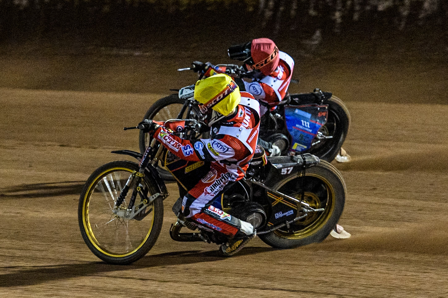 England's Connor Mountain (Yellow) inside Australia's Ben Cook (Red) during the Peter Craven Memorial Trophy meeting at the National Speedway Stadium, Manchester on Monday 18th March 2024. (Photo: Ian Charles | MI News)