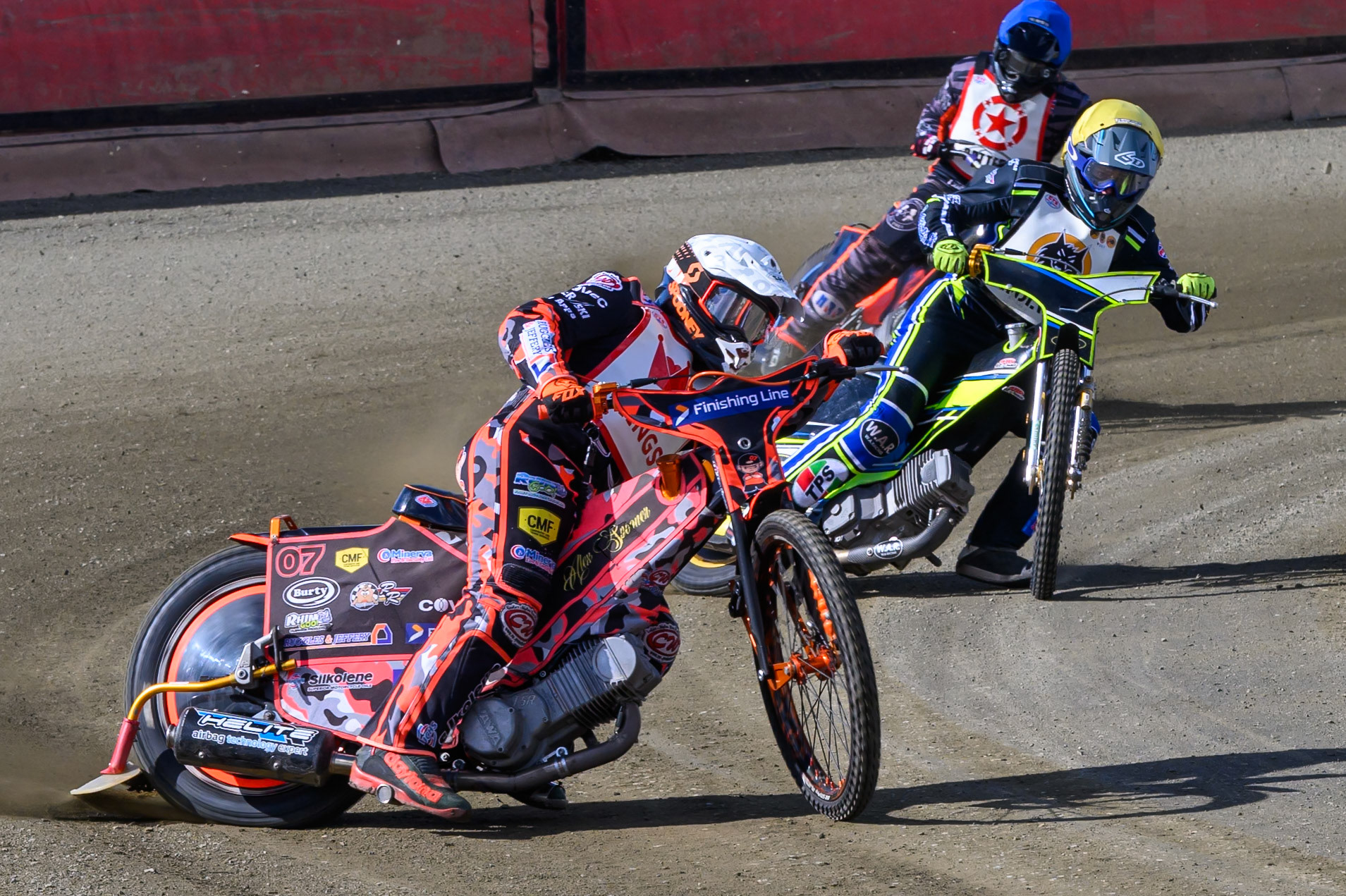 Alex Spooner of 'The Kings' in White leading Kieran Douglas of 'The Wolves'  in Yellow and Jack Roberts of 'The Potters'  in Blue during the Regina Chains Fours at Buxton Speedway, Buxton on Sunday 5th April 2026. (Photo: Ian Charles | MI News)