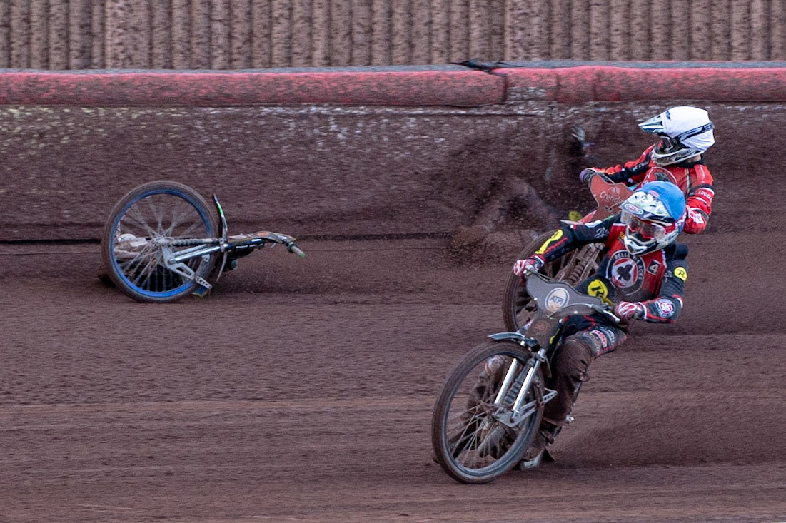 Photo by Ian Charles:

Dan Bewley  (Red) falls after clashing with Rohan Tungate (White) with Steve Worrall  leading

Belle Vue Aces v Peterborough Panthers, British Speedway Premiership, National Speedway Stadium, Manchester, Thursday, 13, June, 2019
