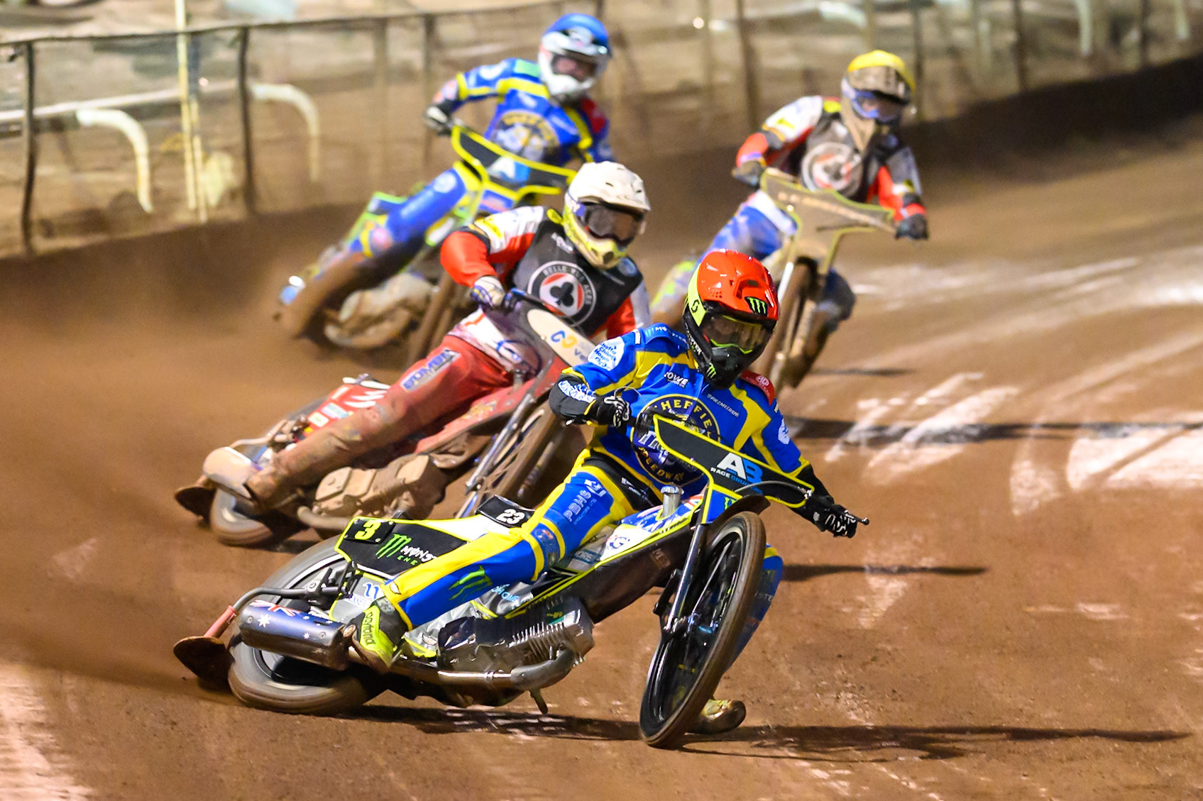 Chris Holder of Sheffield Tigers  in Red leading Chris Harris Guest Rider for Belle Vue Aces in White, Leon Flint of Sheffield Tigers  in Blue and Kye Thomson, Guest Rider for Belle Vue Aces in Yellow during the Knockout Cup Northern Section match between Sheffield Tigers and Belle Vue Aces at Owlerton Stadium, Sheffield on Thursday 2nd April 2026. (Photo: Ian Charles | MI News)