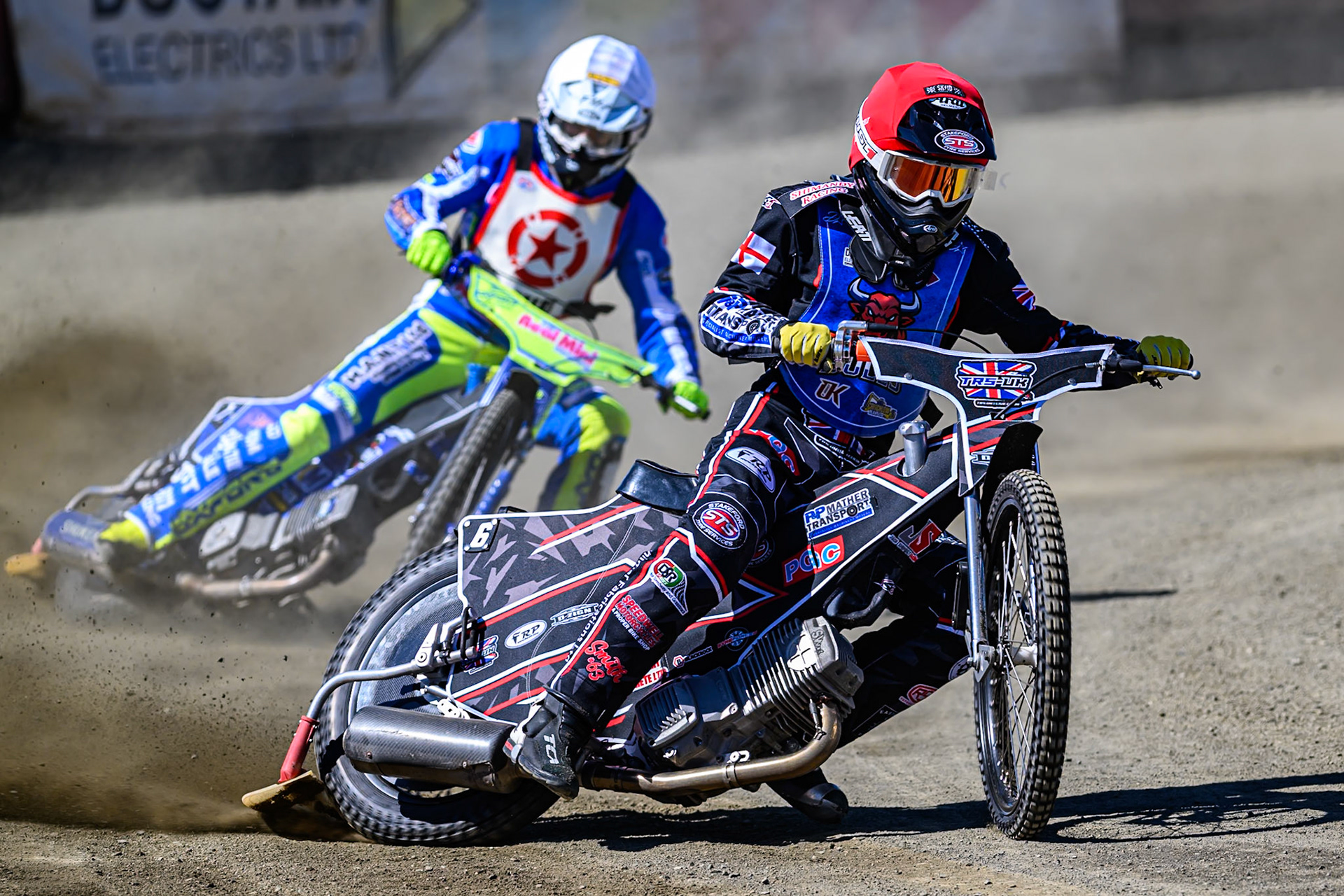 Jack Shimelt of Buxton Bulls in Red leading Max Broadhurst of Stoke Potters in White during the National Development League Challenge match between Buxton Bulls and Stoke Potters at Hi-Edge Speedway, Buxton on Sunday 24th May 2026. (Photo: Ian Charles | MI News)