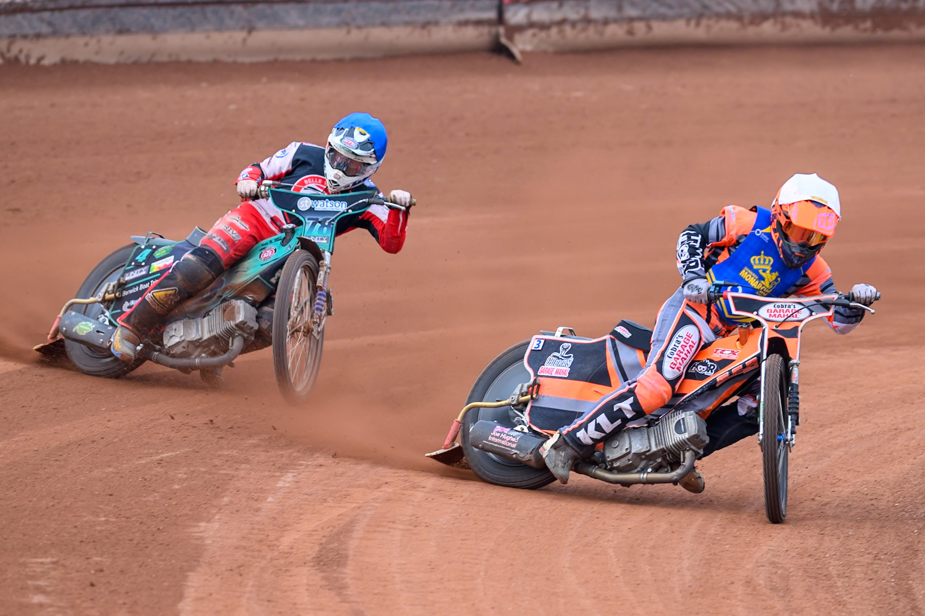 Monarchs' Connor Coles in White leading Belle Vue Colts' Mason Watson in Blue during the WSRA National Development League match between Belle Vue Aces and Edinburgh Academy at the National Speedway Stadium, Manchester on Sunday 12th October 2025. (Photo: Ian Charles | MI News)