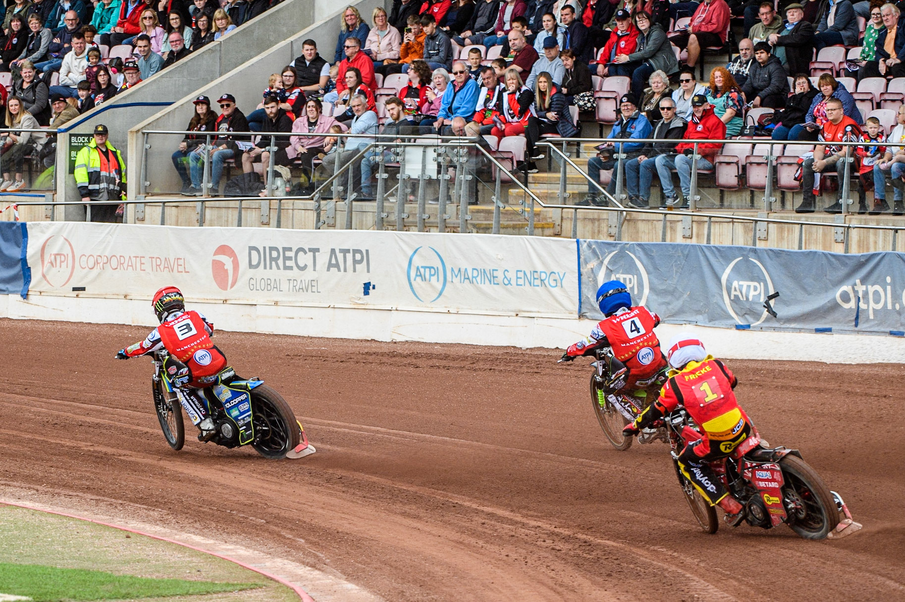 Max Fricke (White) chases Charles Wright (Blue) and Jaimon Lidsey (Red) during the Sports Insure Premiership match between Belle Vue Aces and Leicester Lions at the National Speedway Stadium, Manchester on Monday 28th August 2023. (Photo: Ian Charles | MI News)