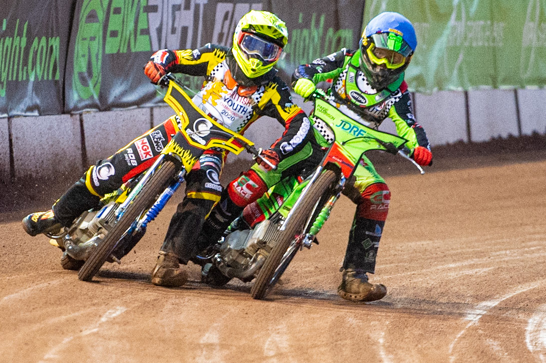 Photo: Ian CharlesLuke Harrison (Blue) and Max James (Yellow) tangle on the back straight (250cc Class)British Youth Speedway Championship (Round 5), National Speedway Stadium, Manchester Saturday  10  October  2020
