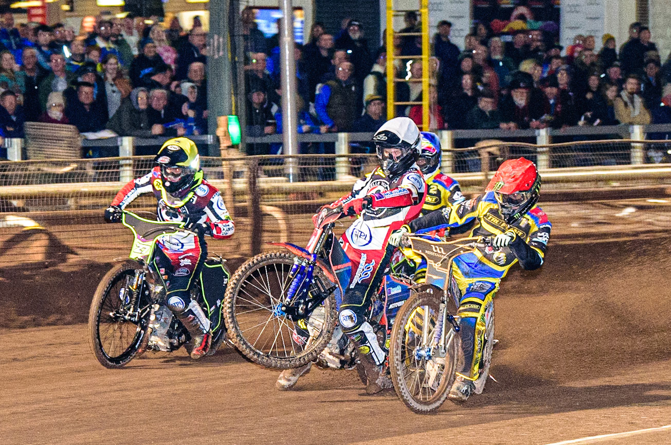 Brady Kurtz  (White) picks up some drive alongside Jack Holder  (Red), Tom Brennan  (Yellow) with David Bellego  (Blue) behind during the Sheffield Tigers vs Belle Vue Aces meeting in the SGP Premiership at Owlerton Stadium, Sheffield on Thursday 23rd March 2023. (Photo: Ian Charles | MI News)