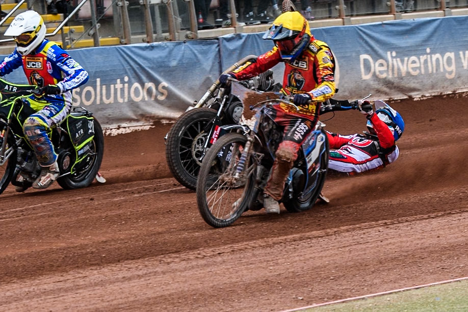 Belle Vue Colts' Billy Budd rears at the start between Leicester Lion Cubs' Guest Rider Darryl Ritchings in White and Leicester Lion Cubs' Sonny Springer in Yellow during the WSRA National Development League match between Belle Vue Colts and Leicester Lion Cubs at the National Speedway Stadium, Manchester on Friday 18th April 2025. (Photo: Ian Charles | MI News)