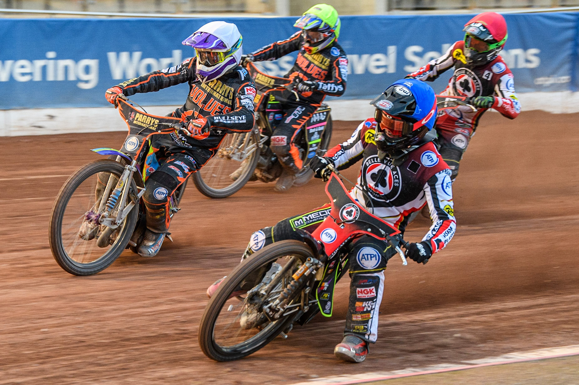 Tom Brennan (Blue) inside Rory Schlein (White) with Charles Wright (Red) and Leon Flint (Yellow) behind during the Sports Insure Premiership match between Belle Vue Aces and Wolverhampton Wolves at the National Speedway Stadium, Manchester on Monday 3rd July 2023. (Photo: Ian Charles | MI News)