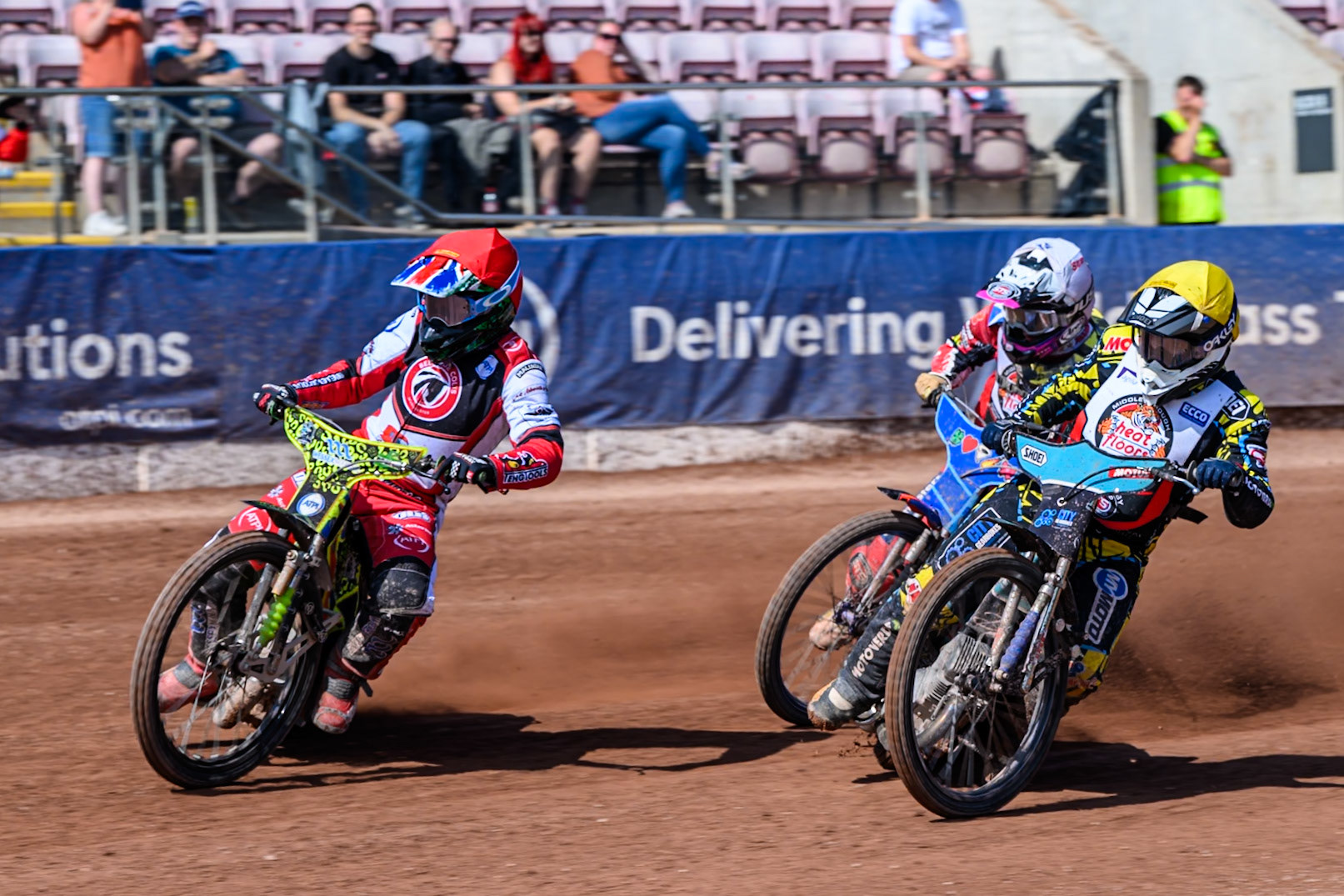 William Cairns of Belle Vue Colts  in Red leading Jamie Halder of Middlesborough Tigers  in Yellow and Stene Pijper of Middlesborough Tigers  in White during the WSRA National Development League match between Belle Vue Colts and Middlesbrough Tigers at the National Speedway Stadium, Manchester on Sunday 10th August 2025. (Photo: Mark Fletcher | MI News)