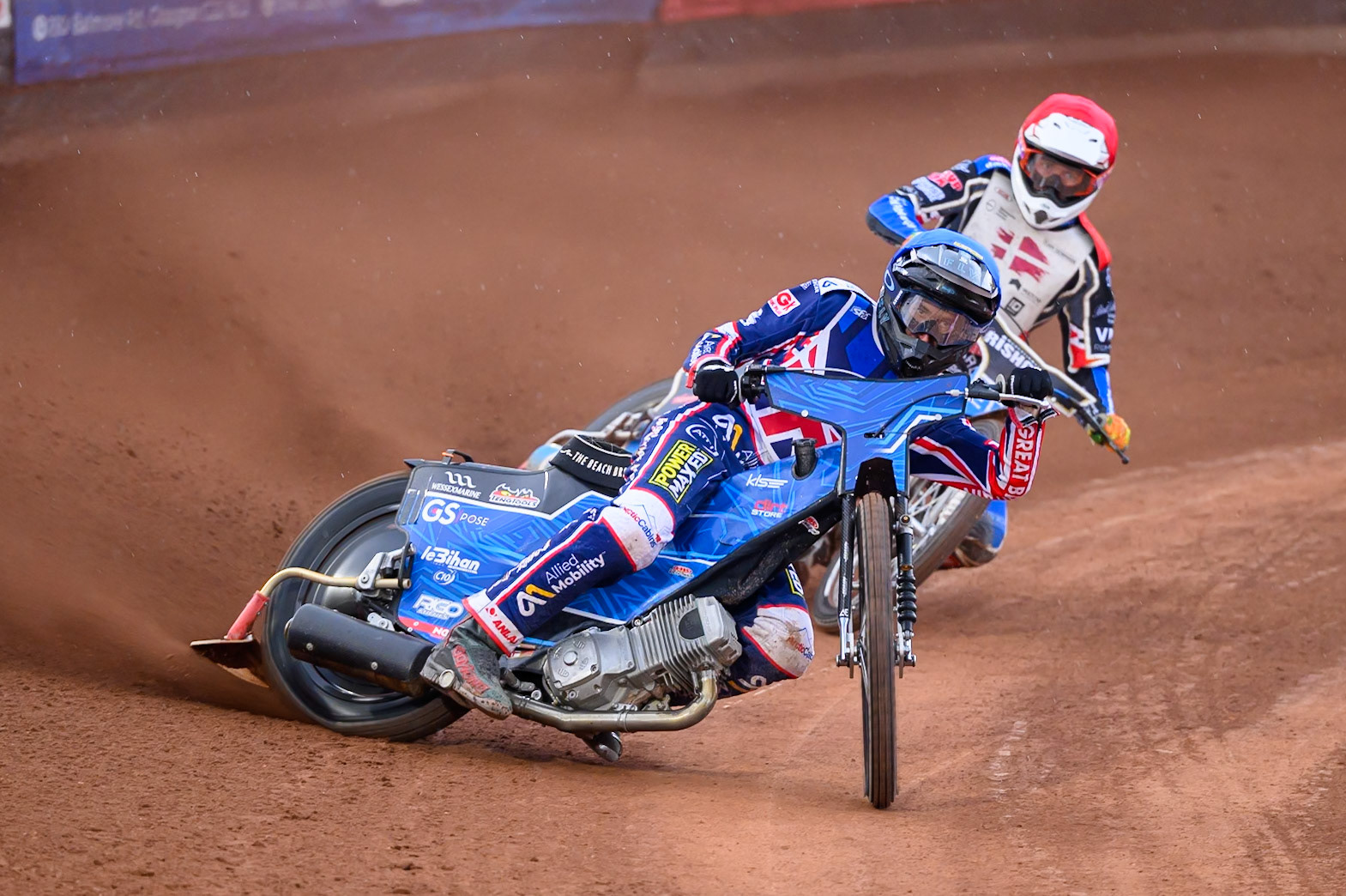 Adam Ellis of Great Britain in Blue leading Frederik Jacobsen of Denmark in Red during the Speedway GP Qualifying Round 3 at Allied Ashfield Stadium, Glasgow on Saturday 30th May 2026. (Photo: Ian Charles | MI News)