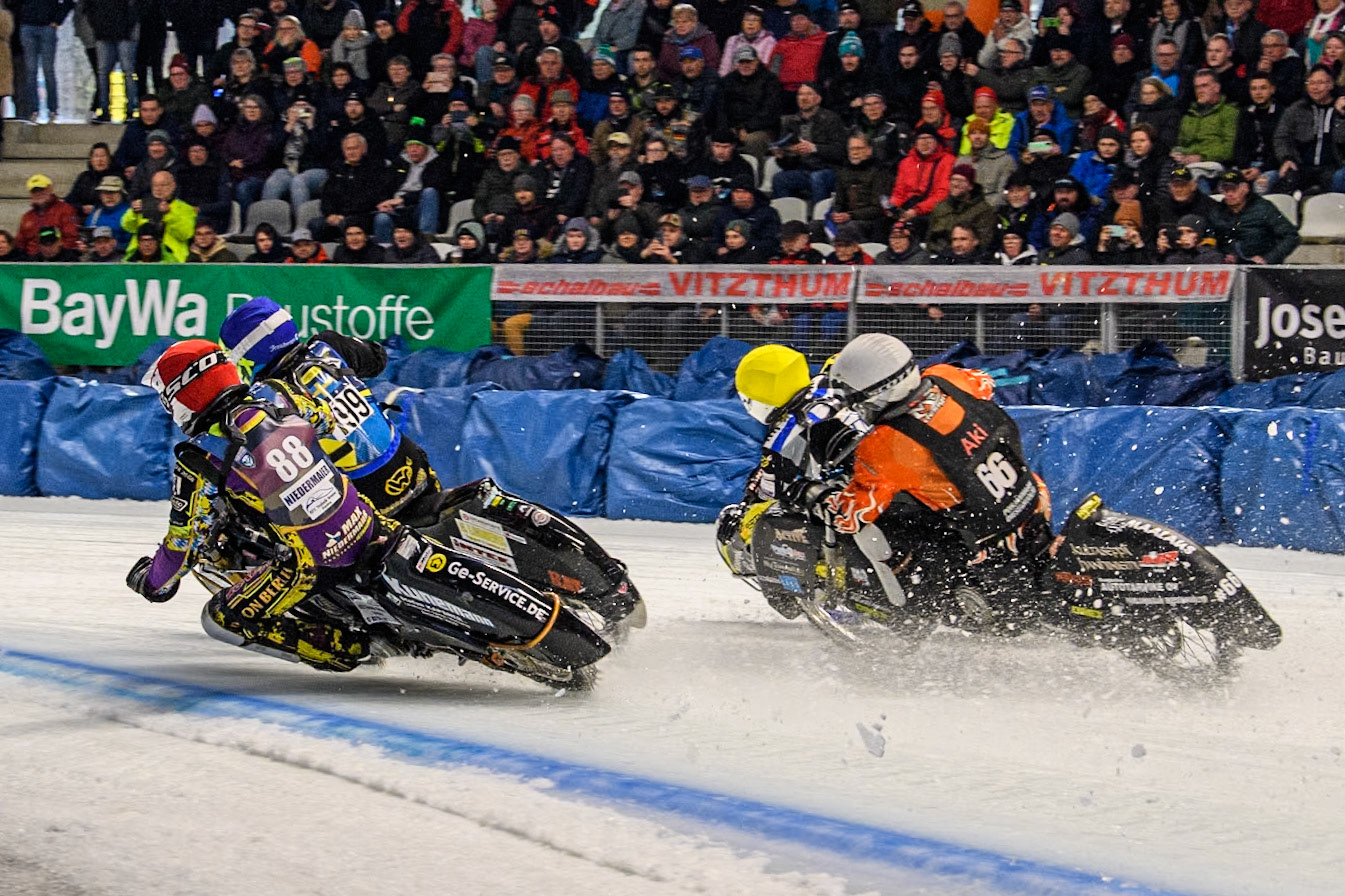 The riders hit the first turn in the Final: Germany's Max Niedermaier (88) (Red), Sweden's Martin Haarahiltunen (199)  (Blue), Finland's Aki Ala-Riihimäki (66) (White) and Finland's Heikki Huusko (67) (Yellow) during the FIM Ice Speedway Gladiators World Championship Final 2 at the Max-Aicher-Arena, Inzell on Sunday 24 March 2024. (Photo: Ian Charles | MI News)