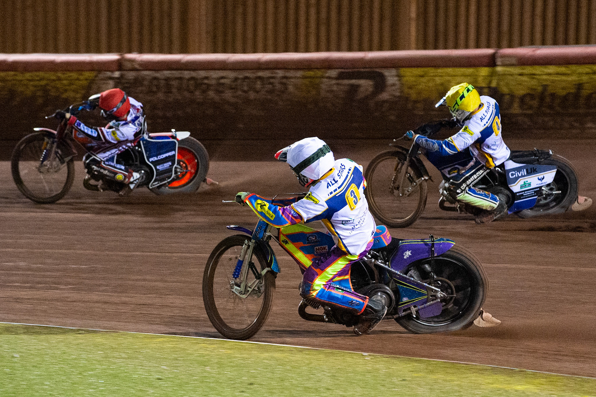 Photo: Ian CharlesRory Schlein of the 'ATPI' All Stars (White) and Richie Worrall of the 'ATPI' All Stars  (Yellow) chase Brady Kurtz of Belle Vue 'BikeRight' Aces (Red)Belle Vue ‘Bikerite ’Aces v ‘ATPI’ All Stars, Premiership Challenge, National Speedway Stadium, Manchester Thursday  24  September  2020