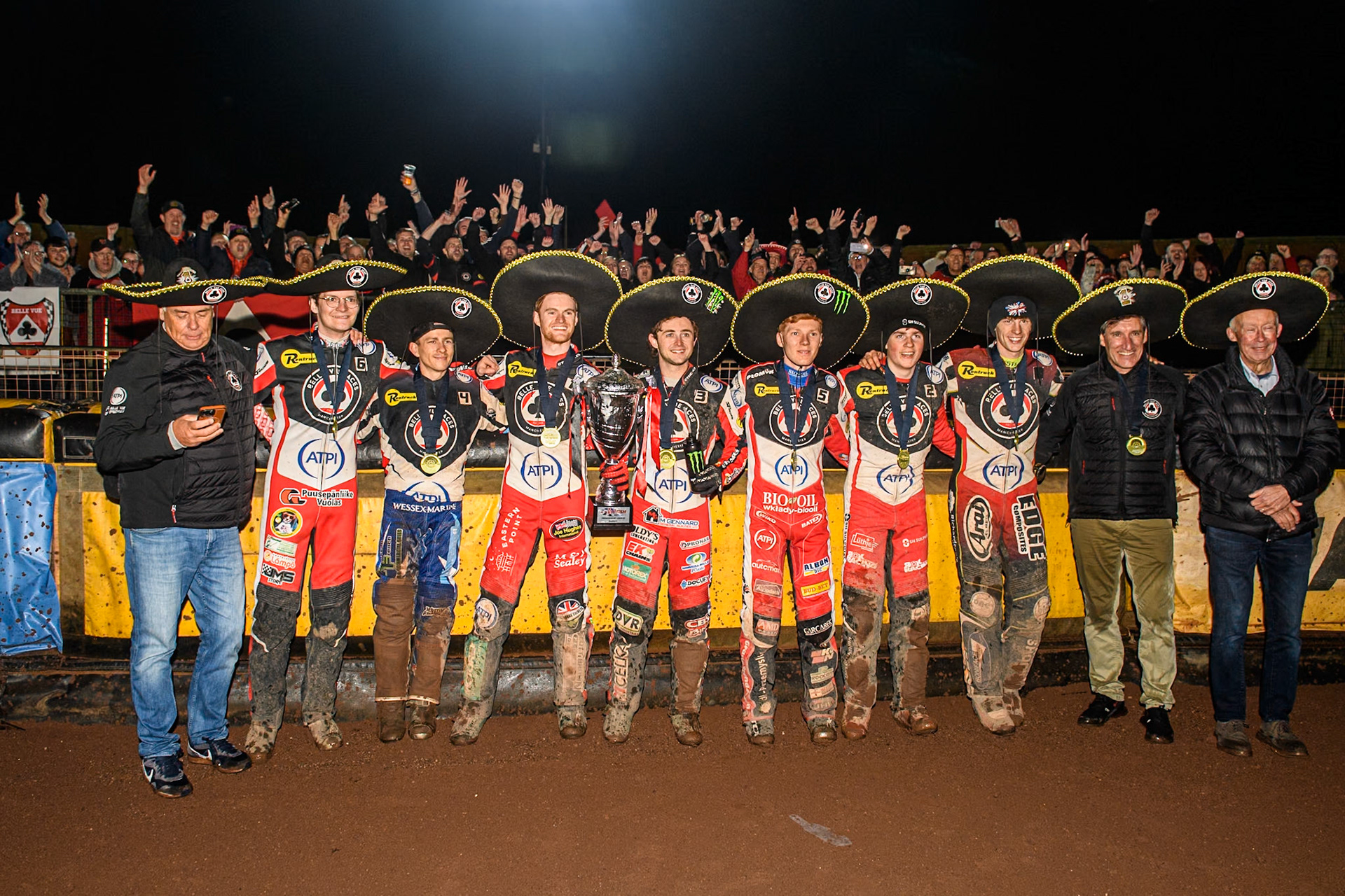 Belle Vue ATPI Aces with the clubs owners celebrate with the fans during the Rowe Motor Oil Premiership Grand Final 2nd Leg between Leicester Lions and Belle Vue Aces at the Pidcock Motorcycles Arena, Leicester on Thursday 26th September 2024. (Photo: Ian Charles | MI News)