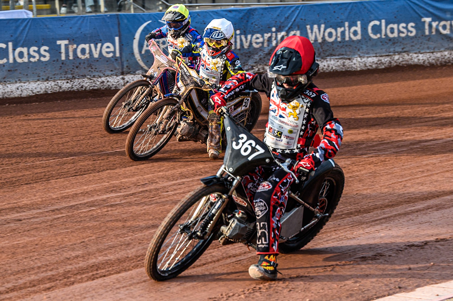 Charlie Luckman (125cc) in Red leading Archie Whitelam (125cc) in White and Rocco Webb (125cc) in Yellow during the British Youth 250cc Championships at the National Speedway Stadium, Manchester on Friday 30th August 2024. (Photo: Ian Charles | MI News)