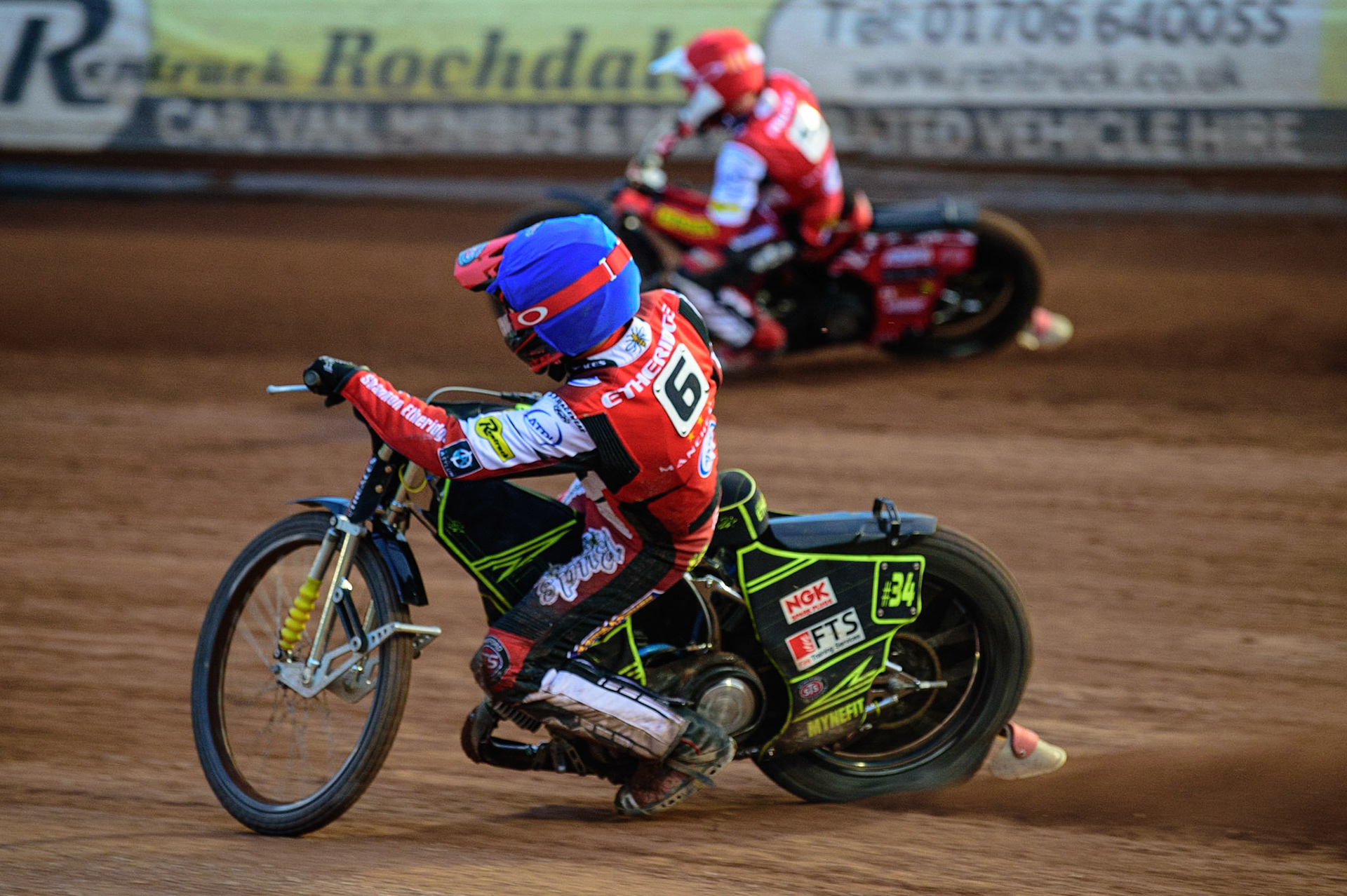 MANCHESTER UK  Jye Etheridge  (Blue) inside Max Fricke  (Red) during the SGB Premiership match between Belle Vue Aces and King's Lynn Stars at the National Speedway Stadium, Manchester on Monday 11th July 2022. (Credit: Ian Charles | MI News)