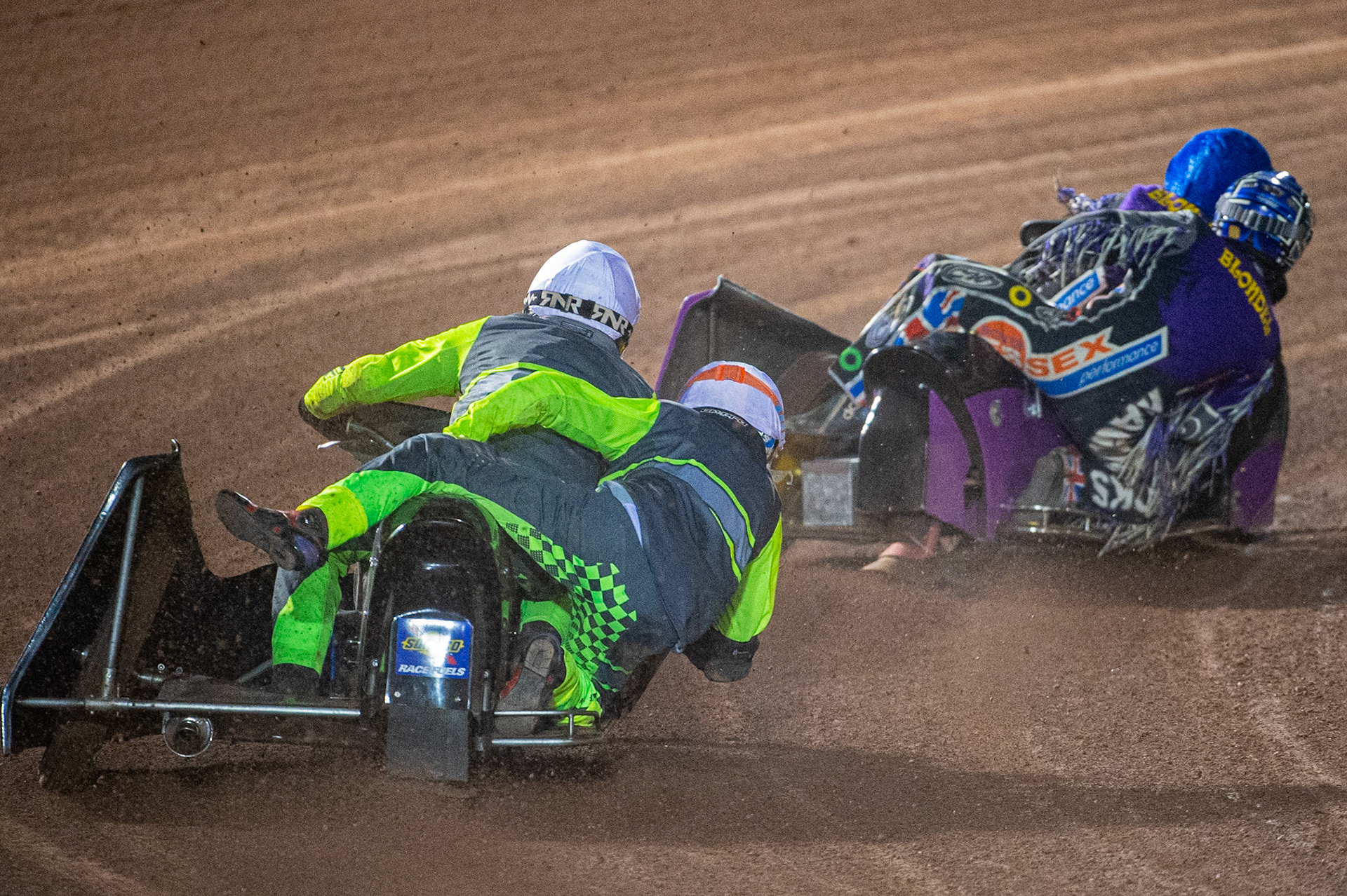 MANCHESTER, ENGLAND Philip Wynn & Adam Cowper Smith(11) (White) chases Clint Blondel & Richard Webb(10) during the  ACU Sidecar Speedway Manchester Masters,  Belle Vue National Speedway Stadium, Manchester Saturday 12 October 2019 (Credit: Ian Charles | MI News)