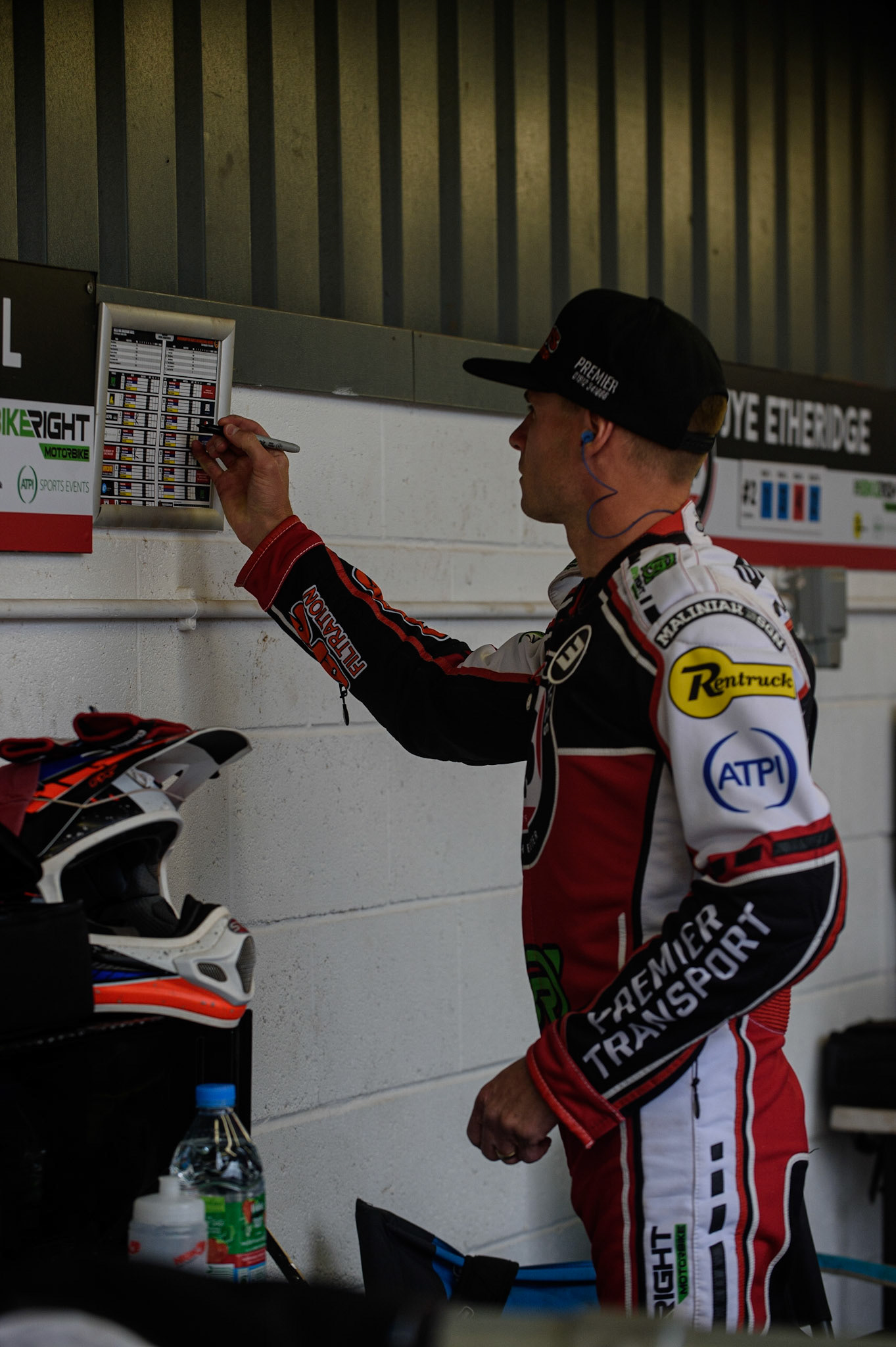 MANCHESTER, UK. AUGUST 30TH Charles Wright  marks his heats on his programme during the SGB Premiership match between Belle Vue Aces and Wolverhampton Wolves at the National Speedway Stadium, Manchester on Monday 30th August 2021. (Credit: Ian Charles | MI News)
