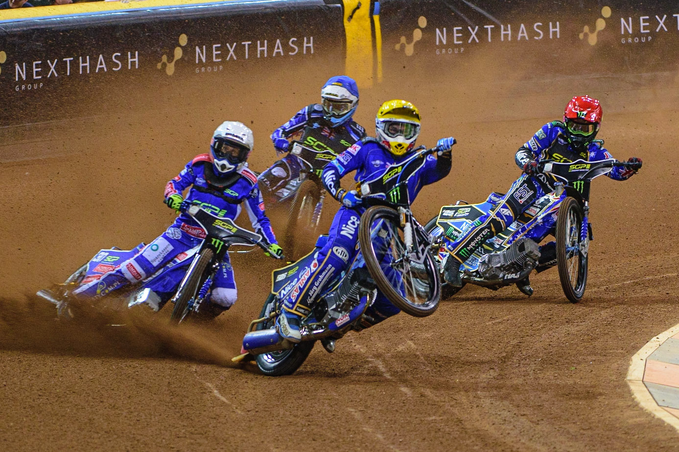 Robert Lambert (505) (Yellow) picks up some drive ahead of Jack Holder (25) (Red), Leon Madsen (30) (White) and Adam Ellis (16) (Blue) during the FIM  Speedway Grand Prix of Great Britain at the Principality Stadium, Cardiff on Saturday 13th August 2022. (Credit: Ian Charles | MI News