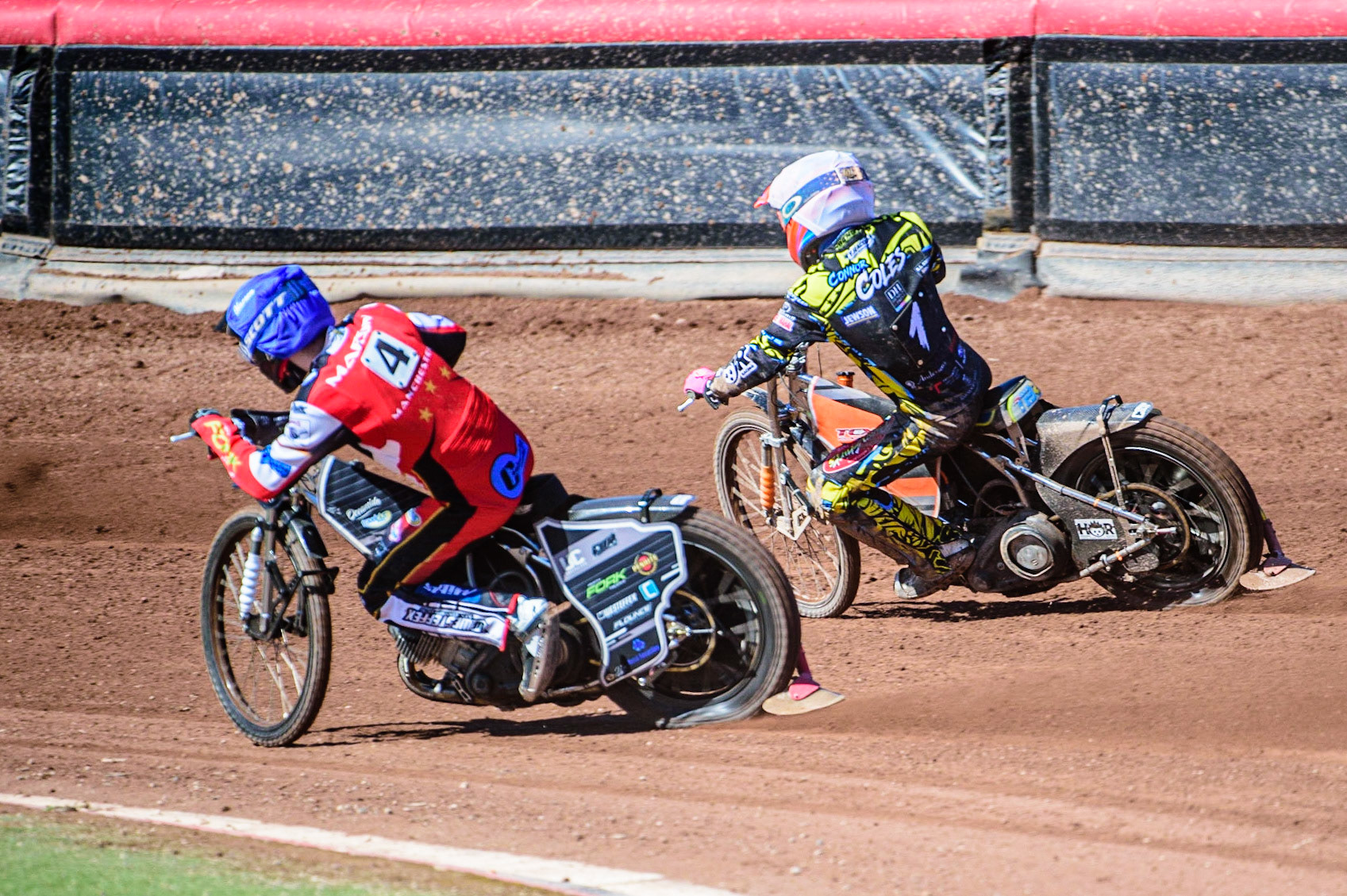 Matt Marson  (Blue) passes Connor Coles  (White) during the National Development League match between Belle Vue Colts and Berwick Bullets at the National Speedway Stadium, Manchester on Friday 7th April 2023. (Photo: Ian Charles | MI News)