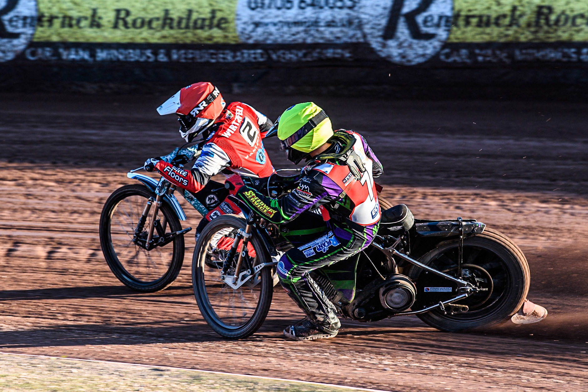 Middlesbrough Tigers' Kai Ward in Yellow chases Belle Vue Colts' Chad Wirtzfeld in Red during the WSRA National Development League match between Belle Vue Colts and Middlesbrough Tigers at the National Speedway Stadium, Manchester on Monday 17th June 2024. (Photo: Ian Charles | MI News)