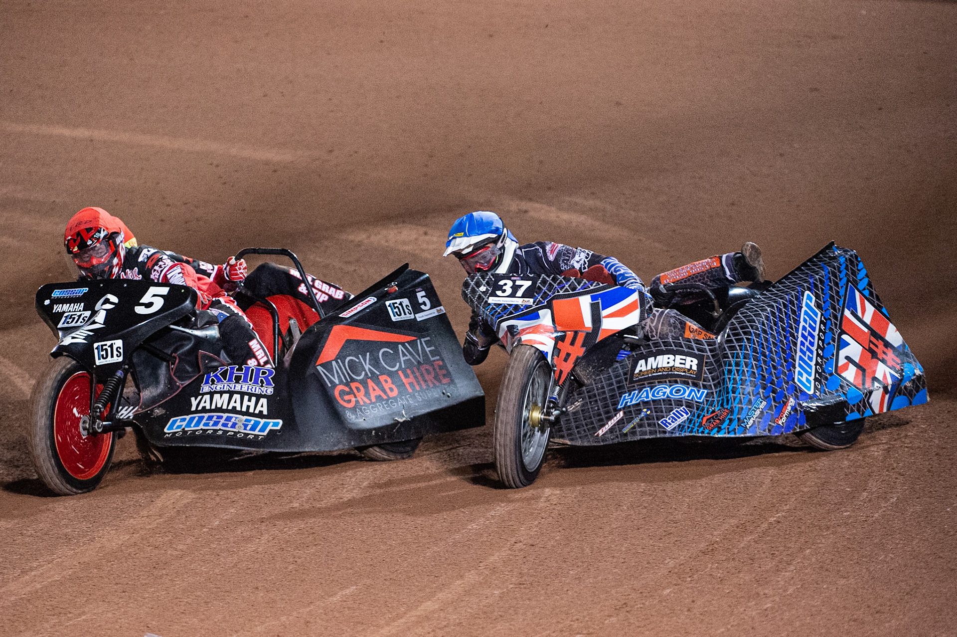 MANCHESTER, ENGLAND Mark Cossar & Carl Pugh (37) passes Mick Cave & Bradley Steer (5) during the  ACU Sidecar Speedway Manchester Masters,  Belle Vue National Speedway Stadium, Manchester Saturday 12 October 2019 (Credit: Ian Charles | MI News)