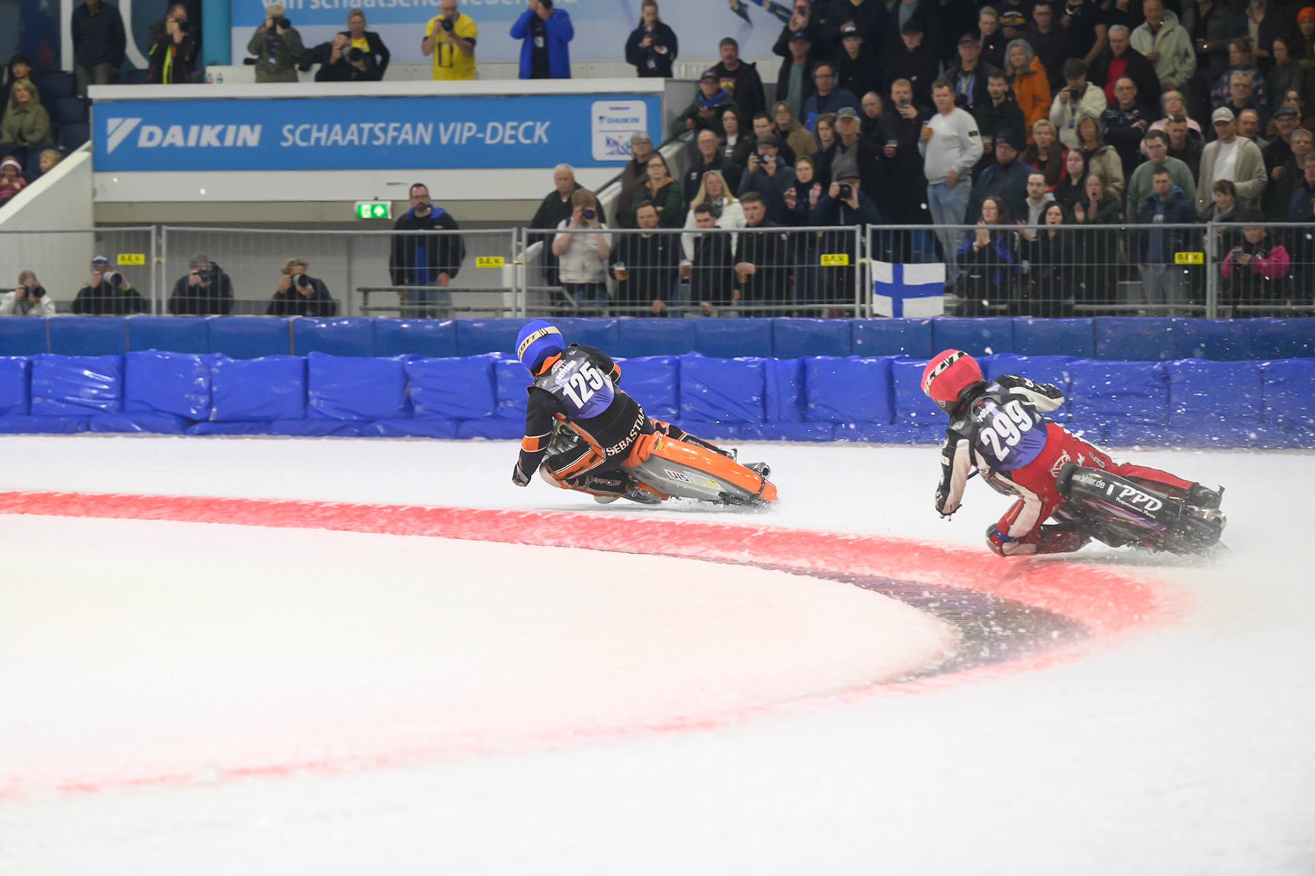 Martin Posch (299) of Austria  in Red chases Sebastian Reitsma (125) of The Netherlands  in Blue during the FIM Ice Speedway Gladiators World Championship Final 3 at Ice Rink Thialf, Heerenveen on Saturday 11th April 2026. (Photo: Ian Charles | MI News)