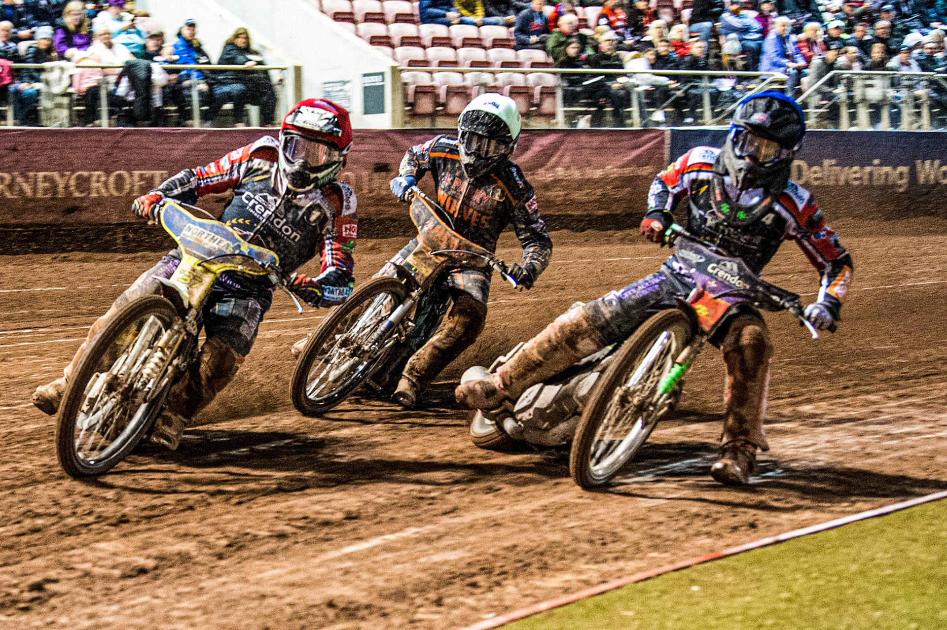 Chris Harris (Red) leadsSam Masters (White) and Benjamin Basso (Blue) during the Grant Henderson Pairs at the National Speedway Stadium, Manchester on Thursday 27th October 2022. (Credit: Ian Charles | MI NEWS)