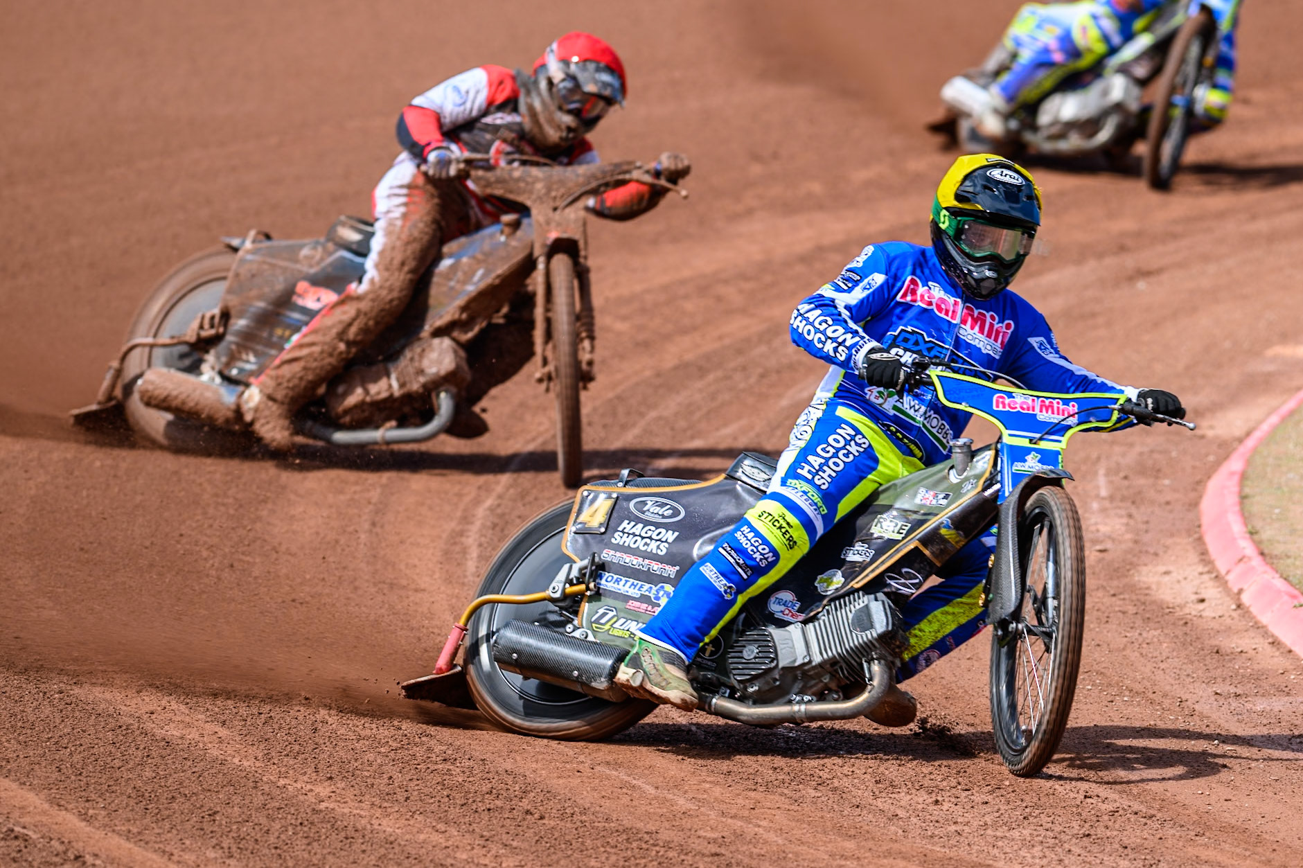Oxford Chargers' Ashton Vale  in Yellow leading Belle Vue Colts' Jack Kingston  in Red during the WSRA National Development League match between Belle Vue Colts and Oxford Chargers at the National Speedway Stadium, Manchester on Sunday 1st June 2025. (Photo: Ian Charles | MI News)