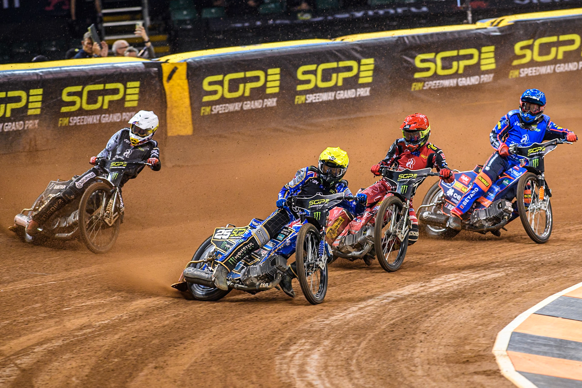 Jack Holder (25) of Australia in Yellow leading Max Fricke (46) of Australia in Red Maciej Janowski (71) of Poland in White and Andzejs Lebedevs (29) of Latvia in Blue during the FIM Speedway Grand Prix of Great Britain at The Principality Stadium, Cardiff on Saturday 17th August 2024. (Photo: Ian Charles | MI News)