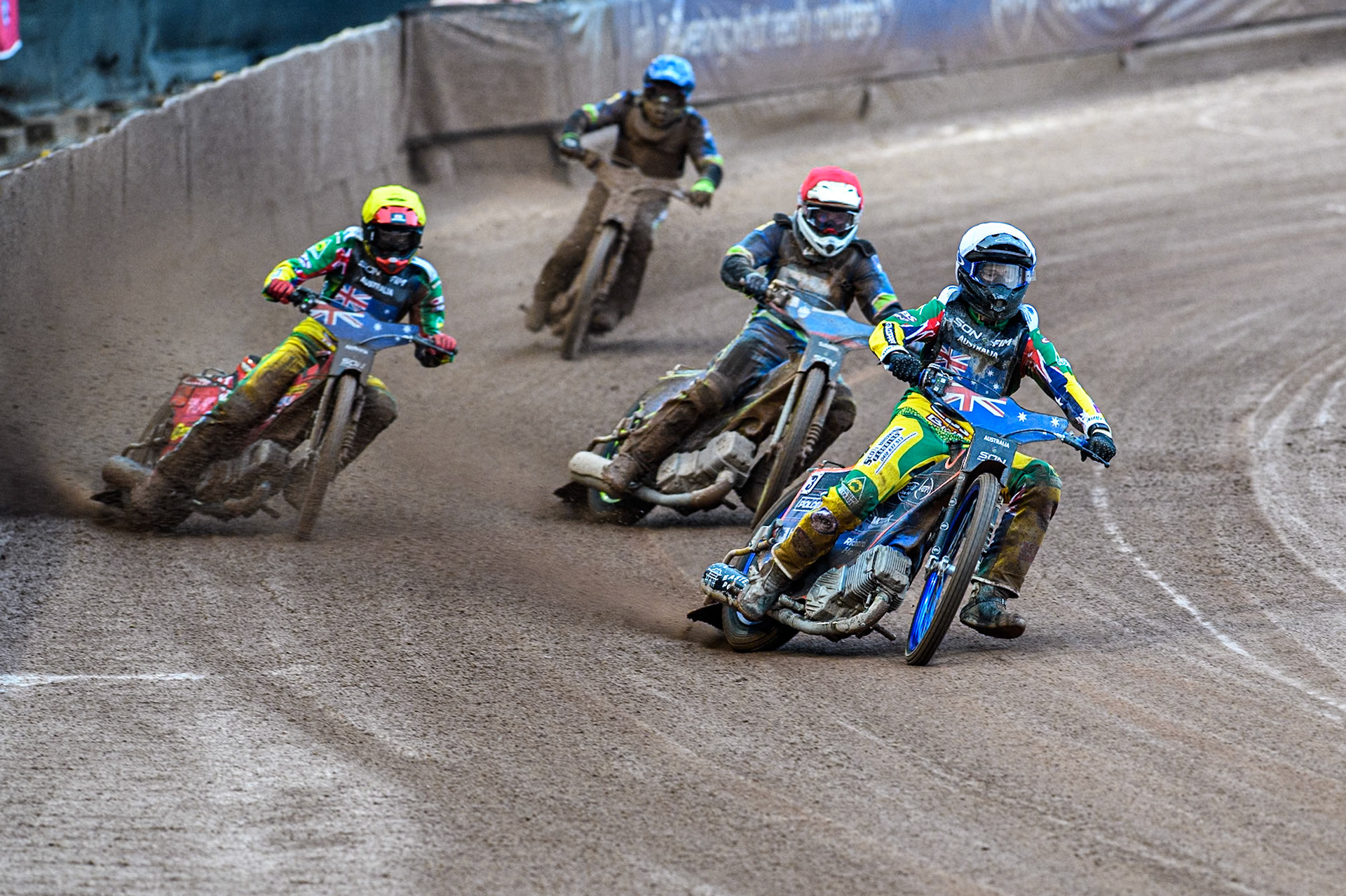 Australia v Slovenia: Brady Kurtz of Australia in White leadingMax Fricke of Australia in Yellow Anze Grmek of Slovenia in Red and Matic Ivacic of Slovenia in Blue during the Monster Energy FIM Speedway of Nation Semi Final 2 at the National Speedway Stadium, Manchester on Wednesday 10th July 2024. (Photo: Ian Charles | MI News)
