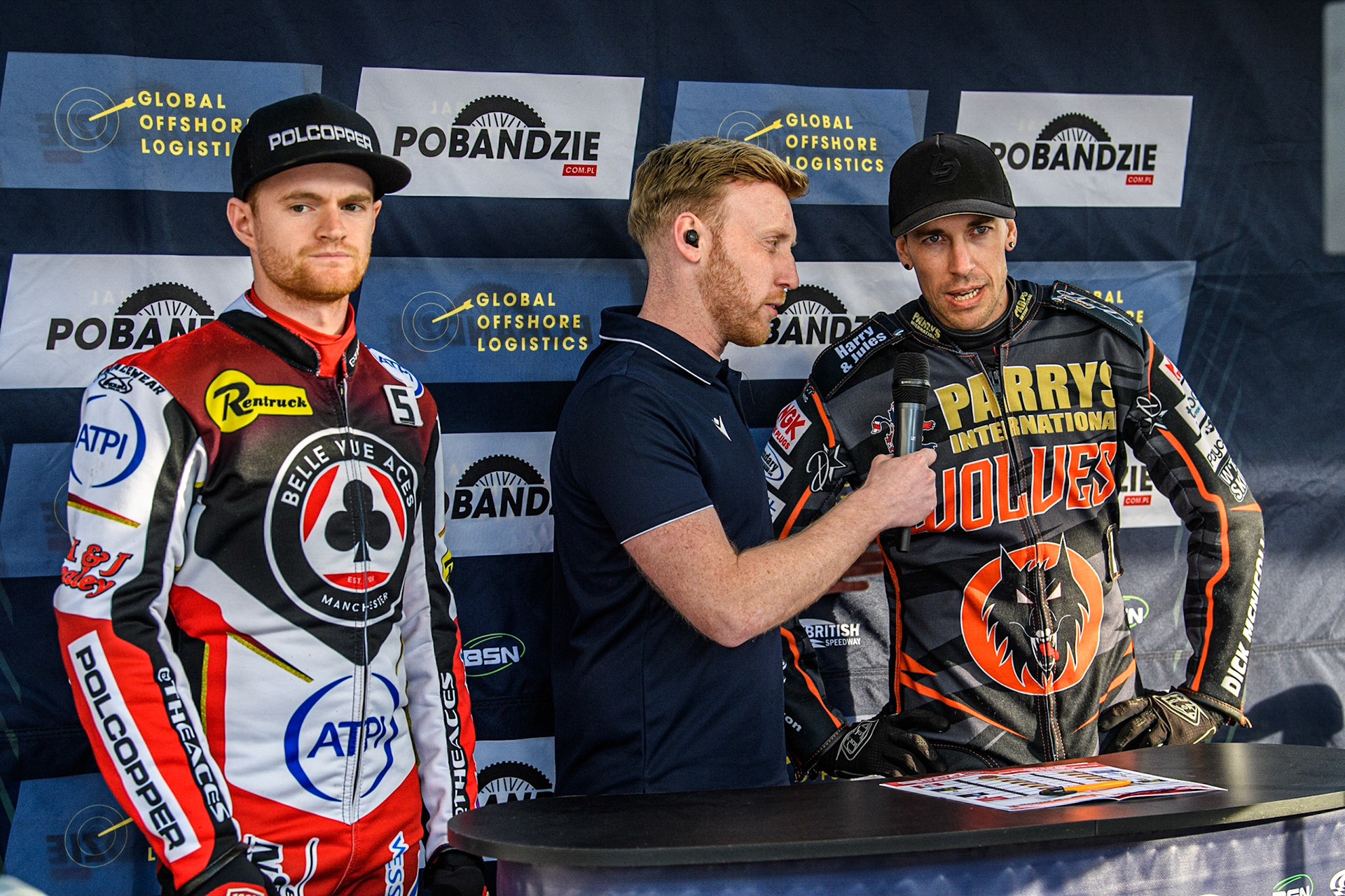 BSN Presenter Paul Bowen interview Sam Masters (right) whilst Brady Kurtz waits his turn during the Sports Insure Premiership Knock Out Cup Quarter Final 2nd Leg between Belle Vue Aces and Wolverhampton Wolves at the National Speedway Stadium, Manchester on Thursday 18th May 2023. (Photo: Ian Charles | MI News)