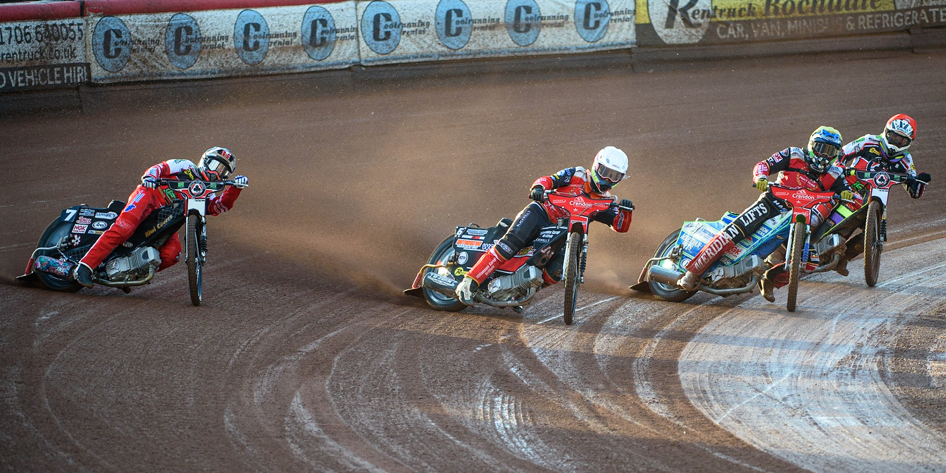 MANCHESTER, UK. AUG 9TH  Jordan Palin  (White) and Hans Andersen  (Yellow) lead Tom Brennan  (Red) and Ricky Wells  (Blue) during the SGB Premiership match between Belle Vue Aces and Peterborough at the National Speedway Stadium, Manchester on Monday 9th August 2021. (Credit: Ian Charles | MI News)
