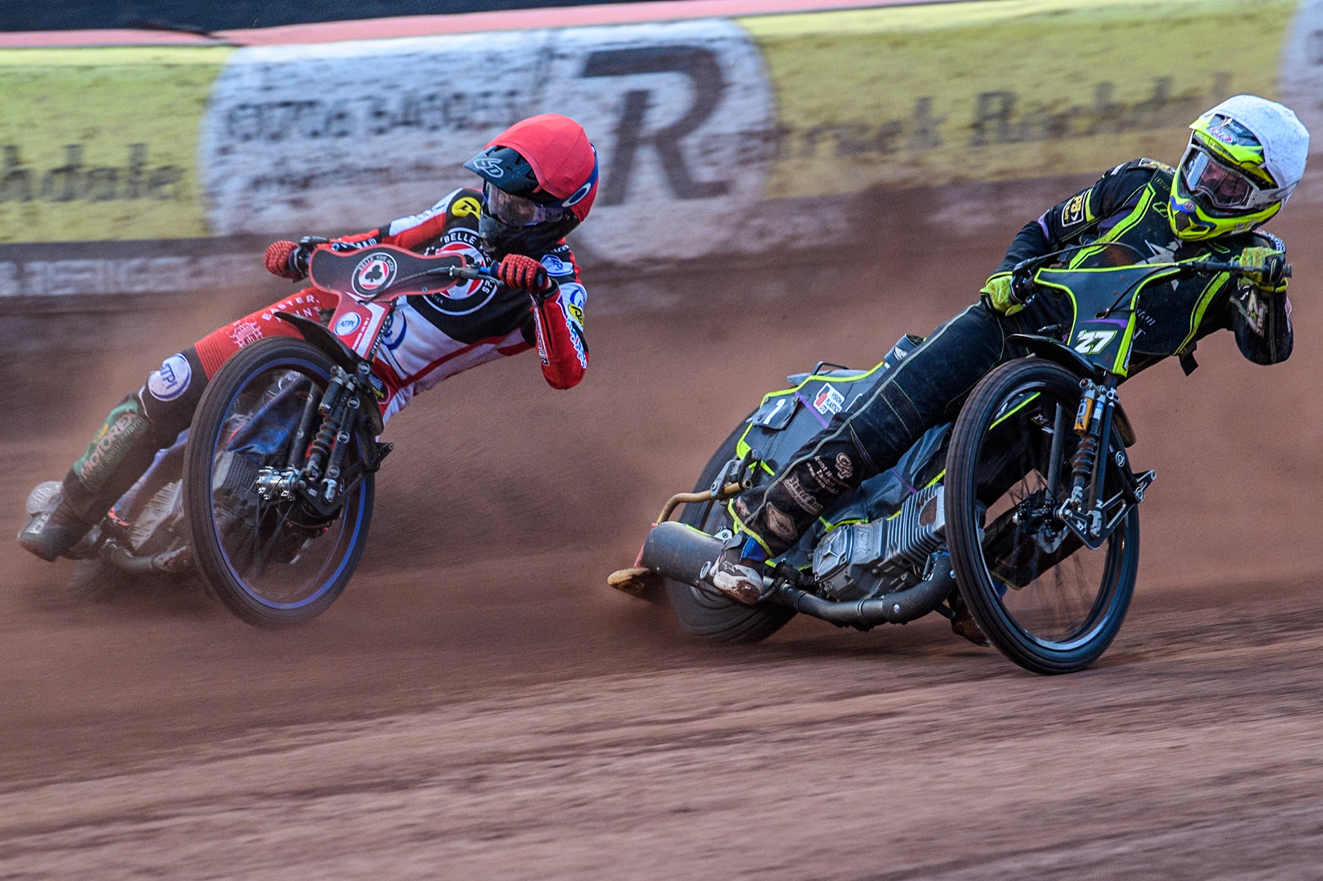 Belle Vue Aces' Brady Kurtz  in Red rides outside Ipswich Witches' Guest Rider Tom Brennan  in White during the Rowe Motor Oil Premiership match between Belle Vue Aces and Ipswich Witches at the National Speedway Stadium, Manchester on Monday 1st July 2024. (Photo: Ian Charles | MI News)