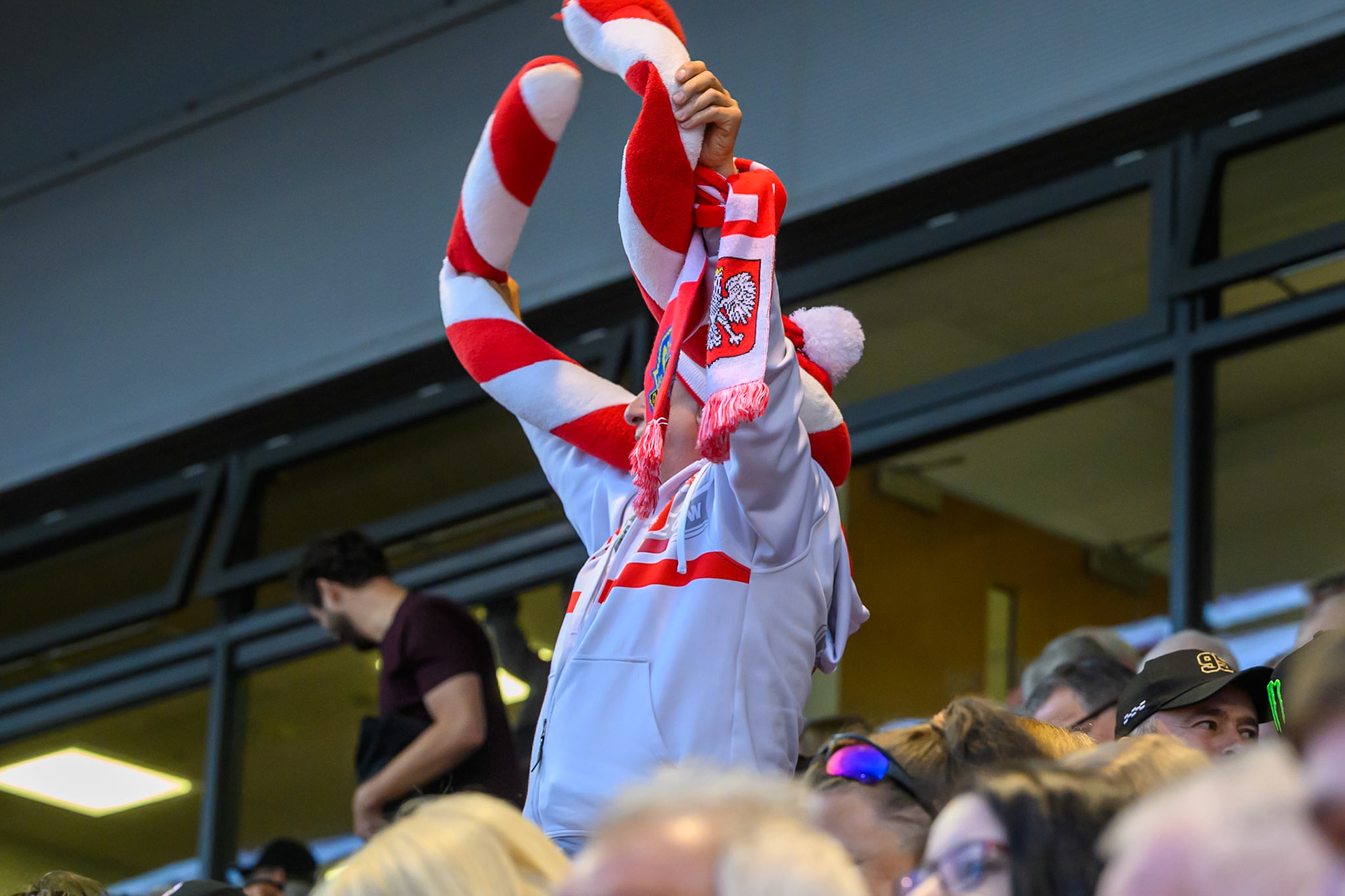 Polish fan celebrates Zmarzlik's win during the ATPI  FIM Speedway GP of Manchester at the National Speedway Stadium, Manchester on Saturday 6th June 2026. (Photo: Ian Charles | MI News)