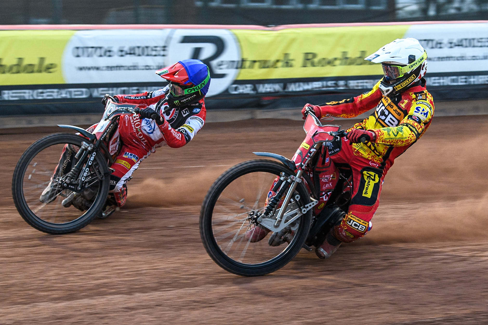 Leicester Lions' Max Fricke in White rides inside Belle Vue Aces' Dan Bewley in Blue during the Rowe Motor Oil Premiership match between Belle Vue Aces and Leicester Lions at the National Speedway Stadium, Manchester on Monday 24th June 2024. (Photo: Ian Charles | MI News)