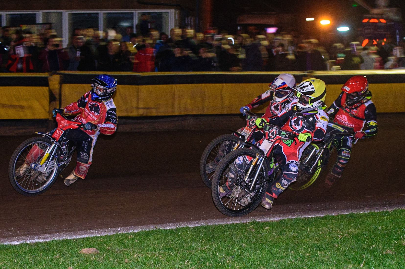 PETERBOROUGH, UK. OCT 14TH Bjarne Pedersen  (Blue) leads Tom Brennan  (Yellow) Steve Worrall   (White) and Craig Cook (Red) during the SGB Premiership Grand Final 2nd leg between Peterborough and Belle Vue Aces at East of England Showground, Peterborough on Thursday 14th October 2021. (Credit: Ian Charles | MI News)