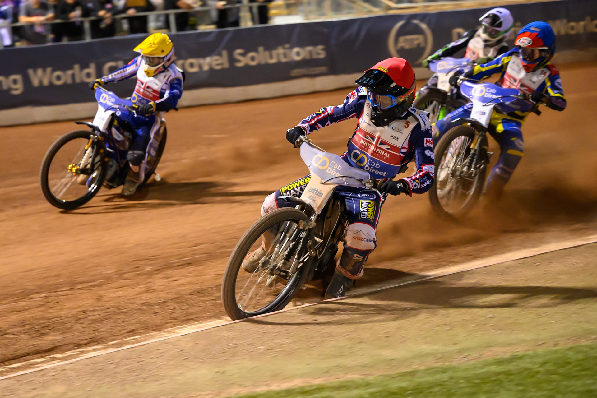 Adam Ellis (5) in Red on the inside of Robert Lambert (4) in Yellow with Leon Flint (14) in Blue  and Charles Wright (11) in White  behind during the Cab Direct British Speedway Championship Final at the National Speedway Stadium, Manchester on Saturday 15th August 2026. (Photo: Ian Charles | MI News)