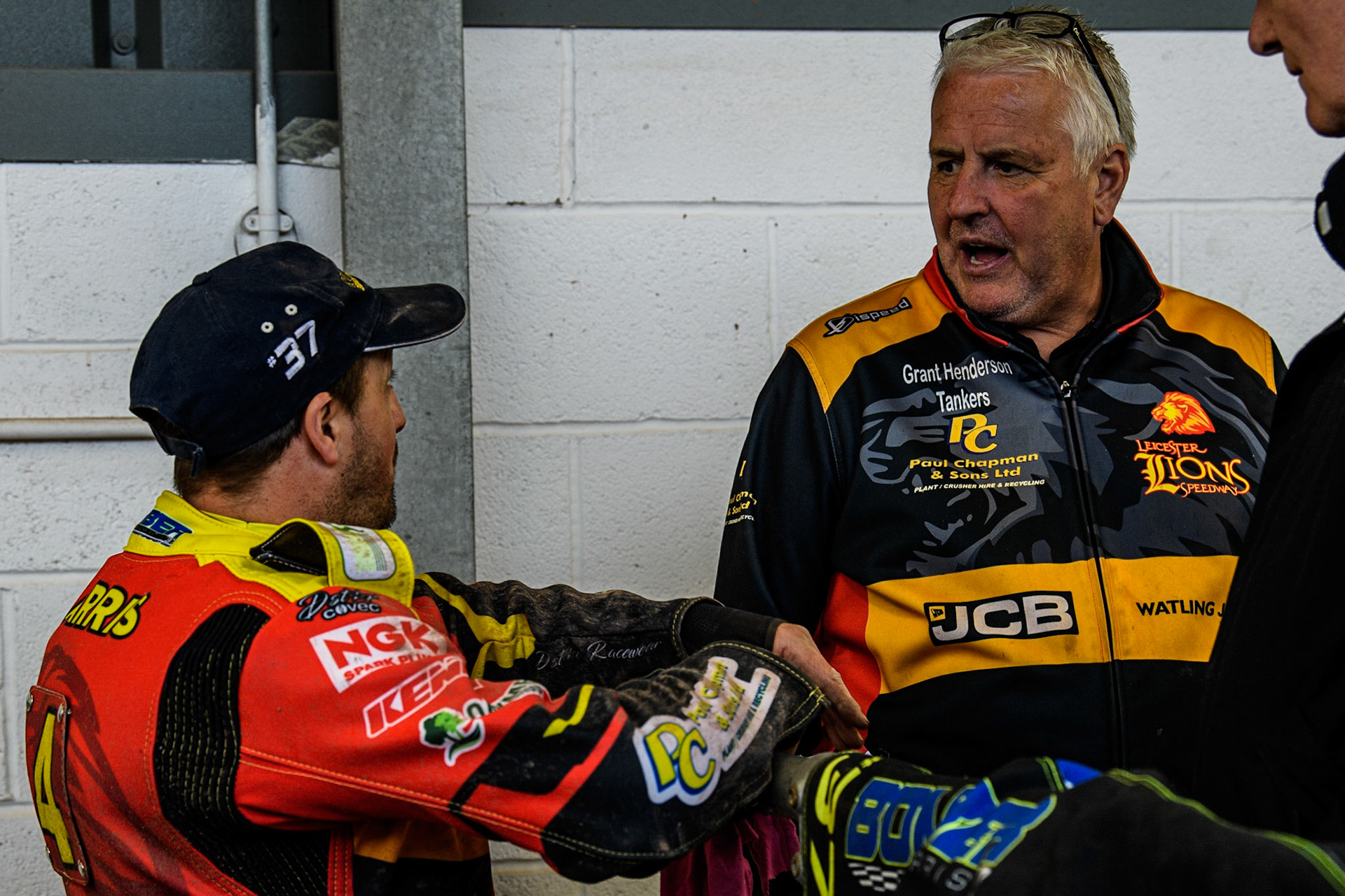 Chris Harris  (left) chats with Leicester Watling JCB Lions  Team Manager Stuart Dickson  during the SGB Premiership match between Belle Vue Aces and Leicester Lions at the National Speedway Stadium, Manchester on Monday 1st May 2023. (Photo: Ian Charles | MI News)