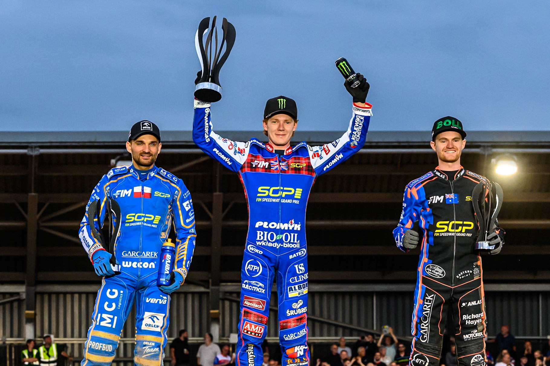 Top3: (L to R) Bartosz Zmarzlik (2nd), Dan Bewley (Winner) Brady Kurtz (3rd) during the ATPI FIM Speedway Grand Prix Round 4 at the National Speedway Stadium, Manchester, on Friday 13th June 2025. (Photo: Ian Charles | MI News)