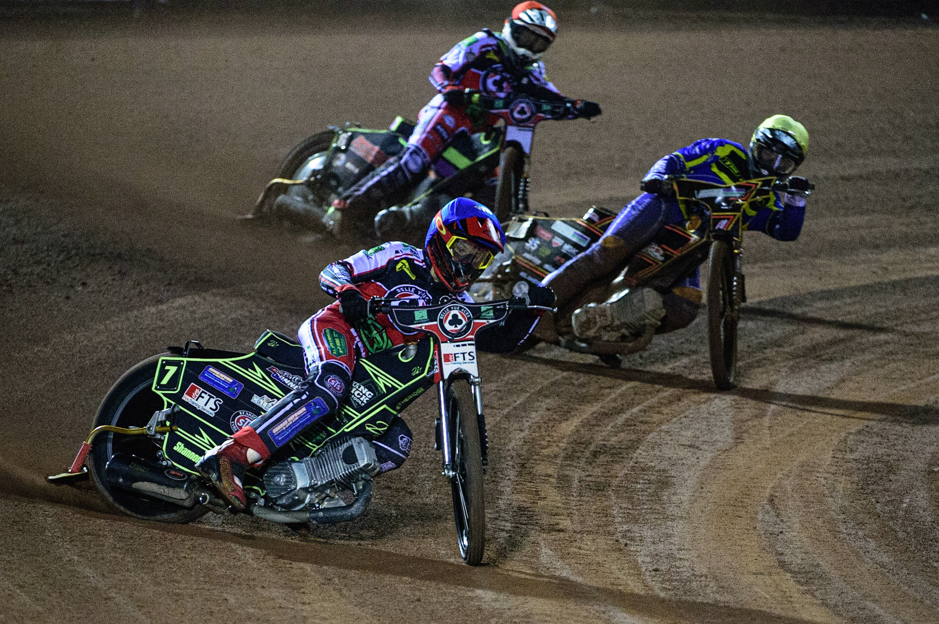 MANCHESTER, UK. OCT 7TH  Jye Etheridge   (Blue) leads Connor Mountain  (Yellow) and Tom Brennan  (Red) during the SGB Premiership Play off Semi-Final Second Leg between Belle Vue Aces and Sheffield Tigers at the National Speedway Stadium, Manchester on Thursday 7th October 2021. (Credit: Ian Charles | MI News)