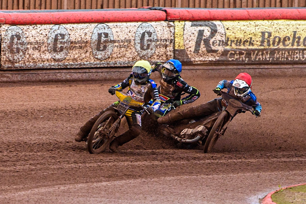 Ben Barker (Yellow) leads as Richard Lawson (Red) and Simon Lambert (Blue) struggle on the heavy track during the Sports Insure British Speedway Final at the National Speedway Stadium, Manchester on Monday 14th August 2023. (Photo: Ian Charles | MI News)