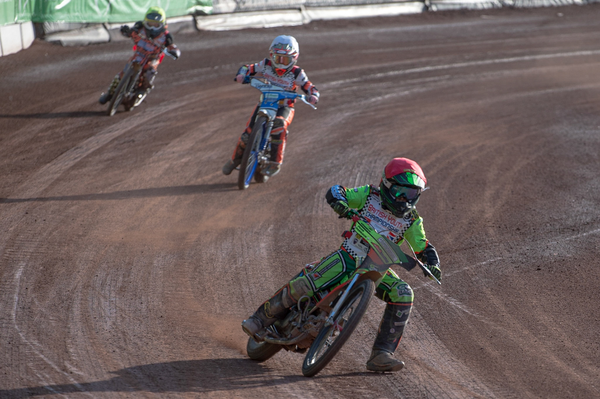 Photo: Ian Charles

Freddie Fox-Baron (Red) leads Charlie Wood (White) and Max Perry (Yellow)

Summer Speed Saturday & British Youth Speedway Championship Round 5, National Speedway Stadium, Manchester, Saturday 22 June 2019